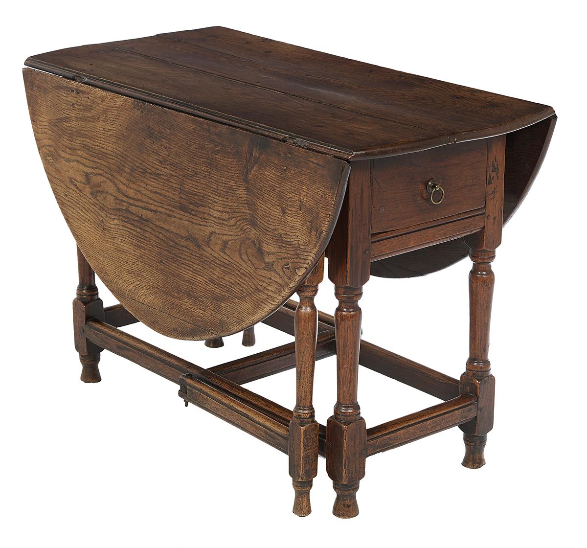 18th century English oak Gateleg table with drop leaves and one drawer.