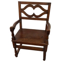 19th Century English Oak Joined Armchair with Persian Pillow.