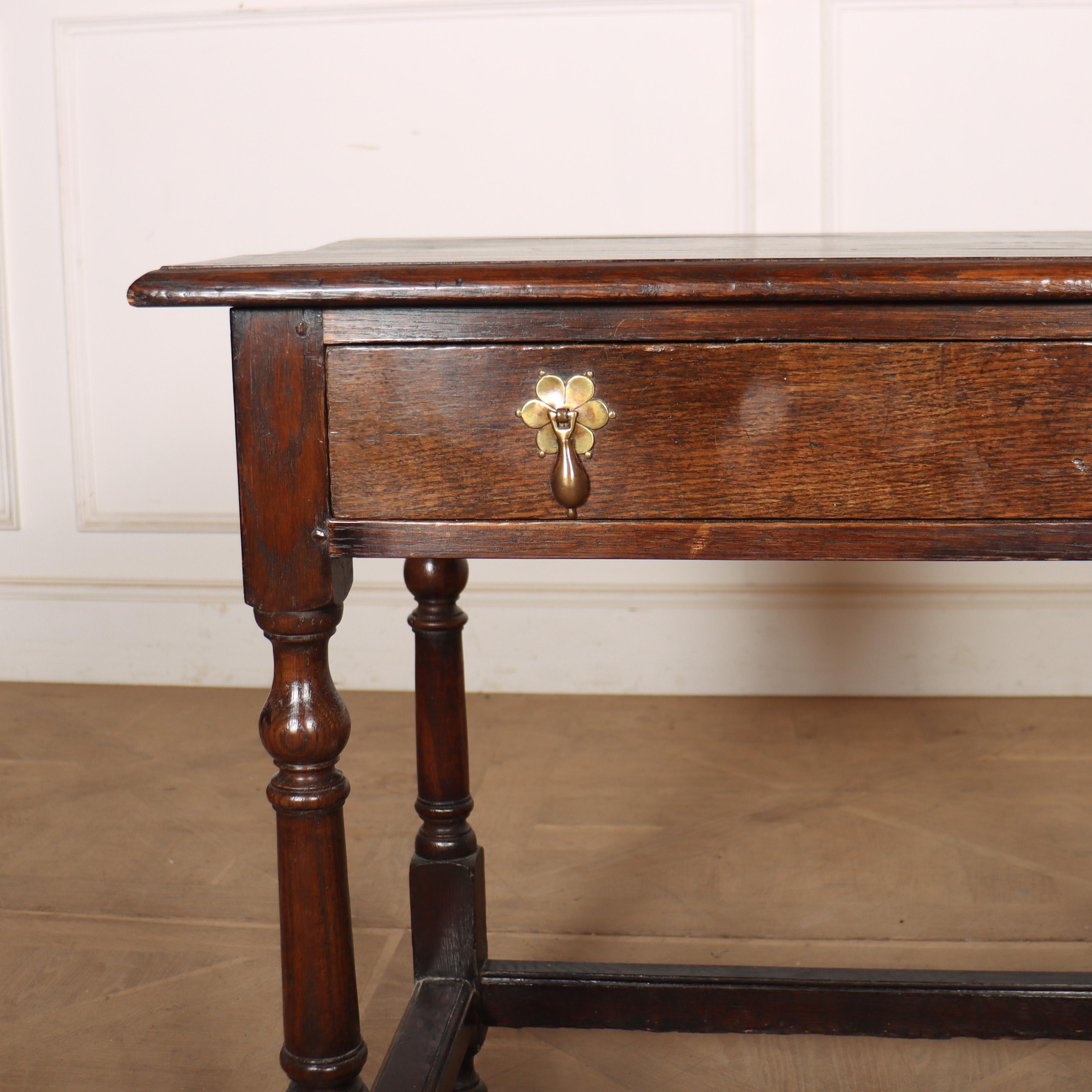 18th century English oak one drawer lamp / side table. Good colour. 1760.

Code: 8704

Dimensions:
W: 33