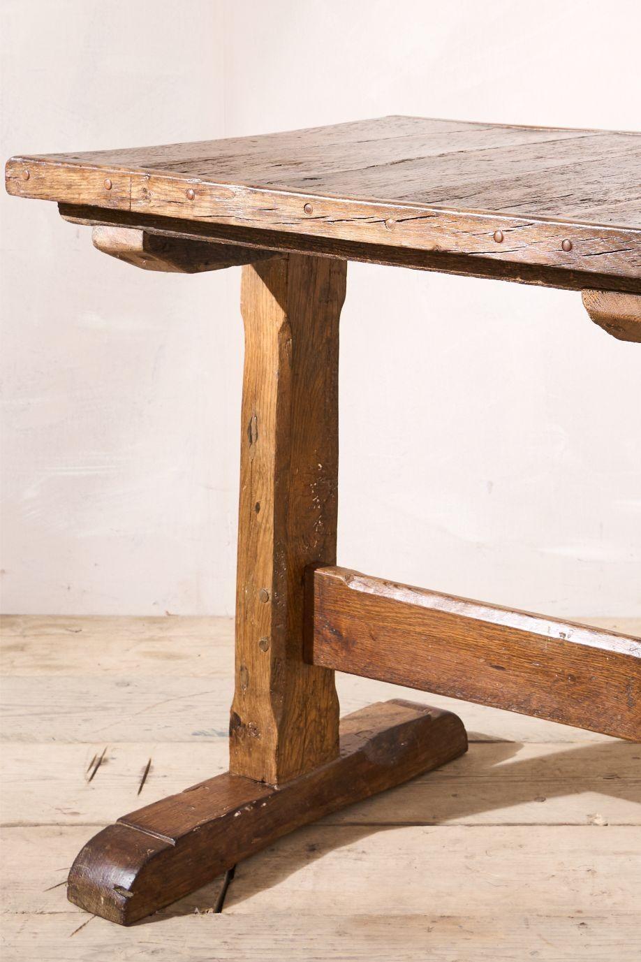 This is a very characterful 18th century Tavern table. Made from oak throughout and clearly made as a two person pub table originally. The patina is stunning and the whole piece is original. This would now work as a gorgeous lamp table. Solid