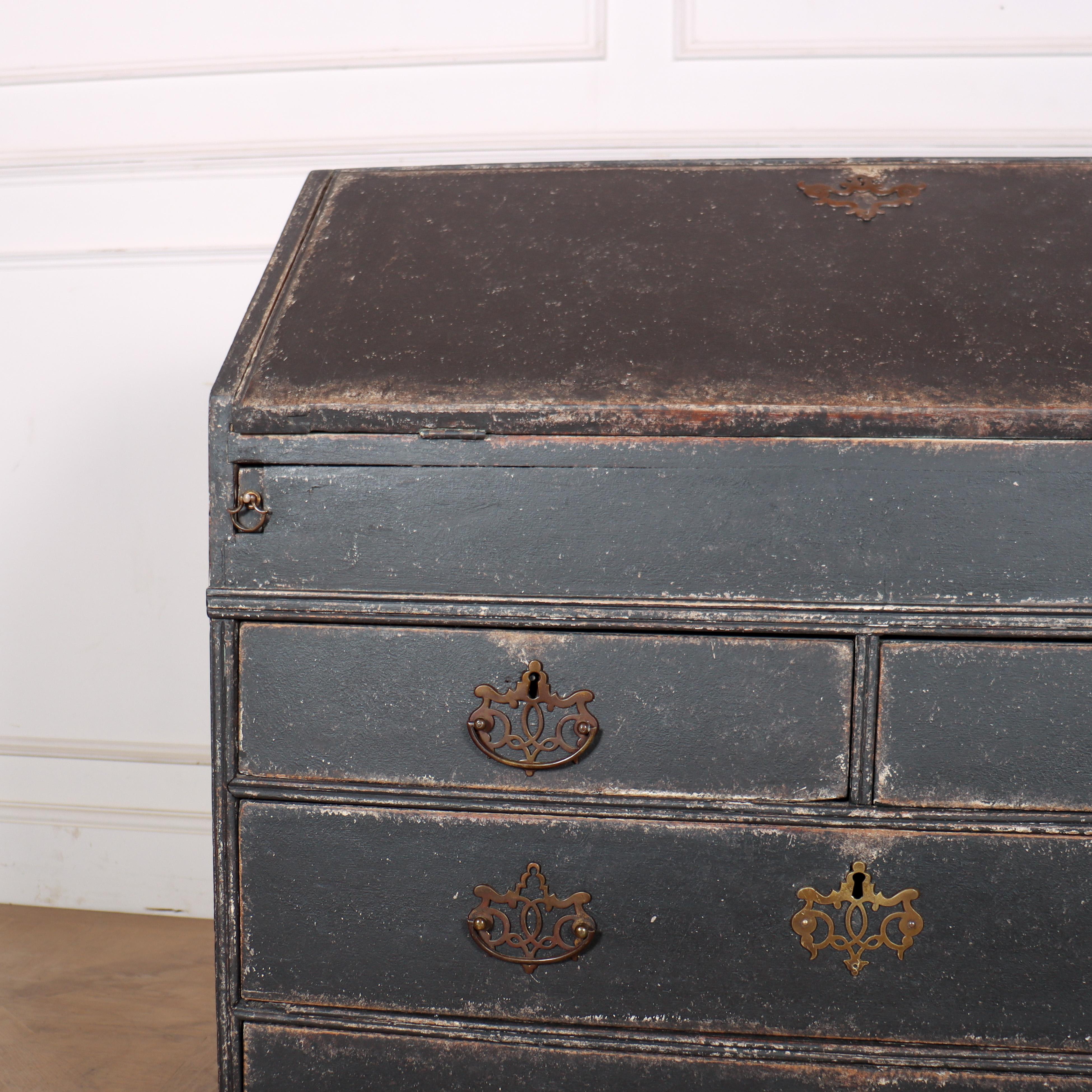 18th century English painted oak bureau with a fitted interior, featuring a hidden well and hidden drawers. 1760.

Height to the underside of the fall front is 73cm.

Code: 8523

Dimensions:
W: 37