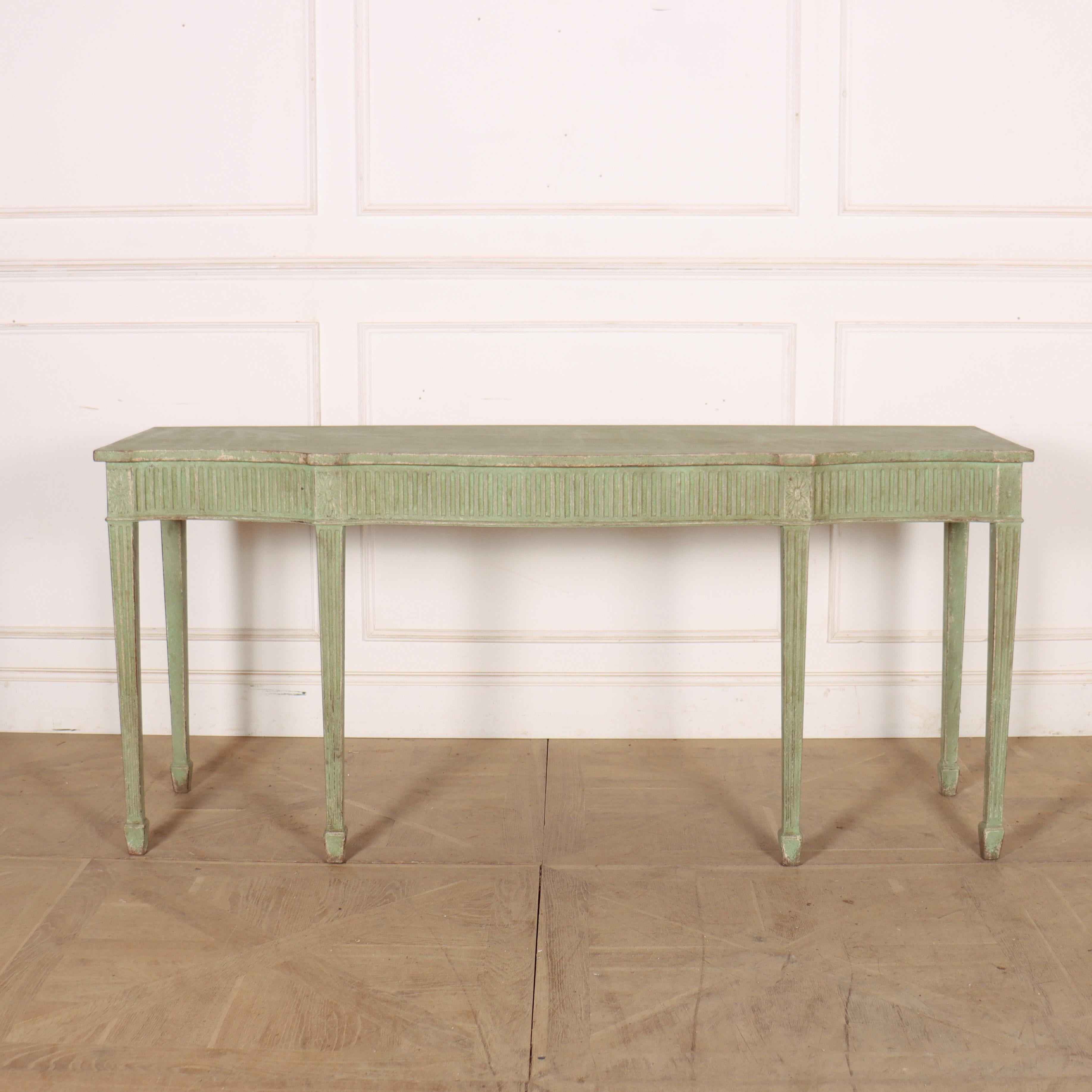 Late 18th century English painted oak console table with fluting to the legs and frieze. 1790. 


Code: 9199

Dimensions:
W: 72