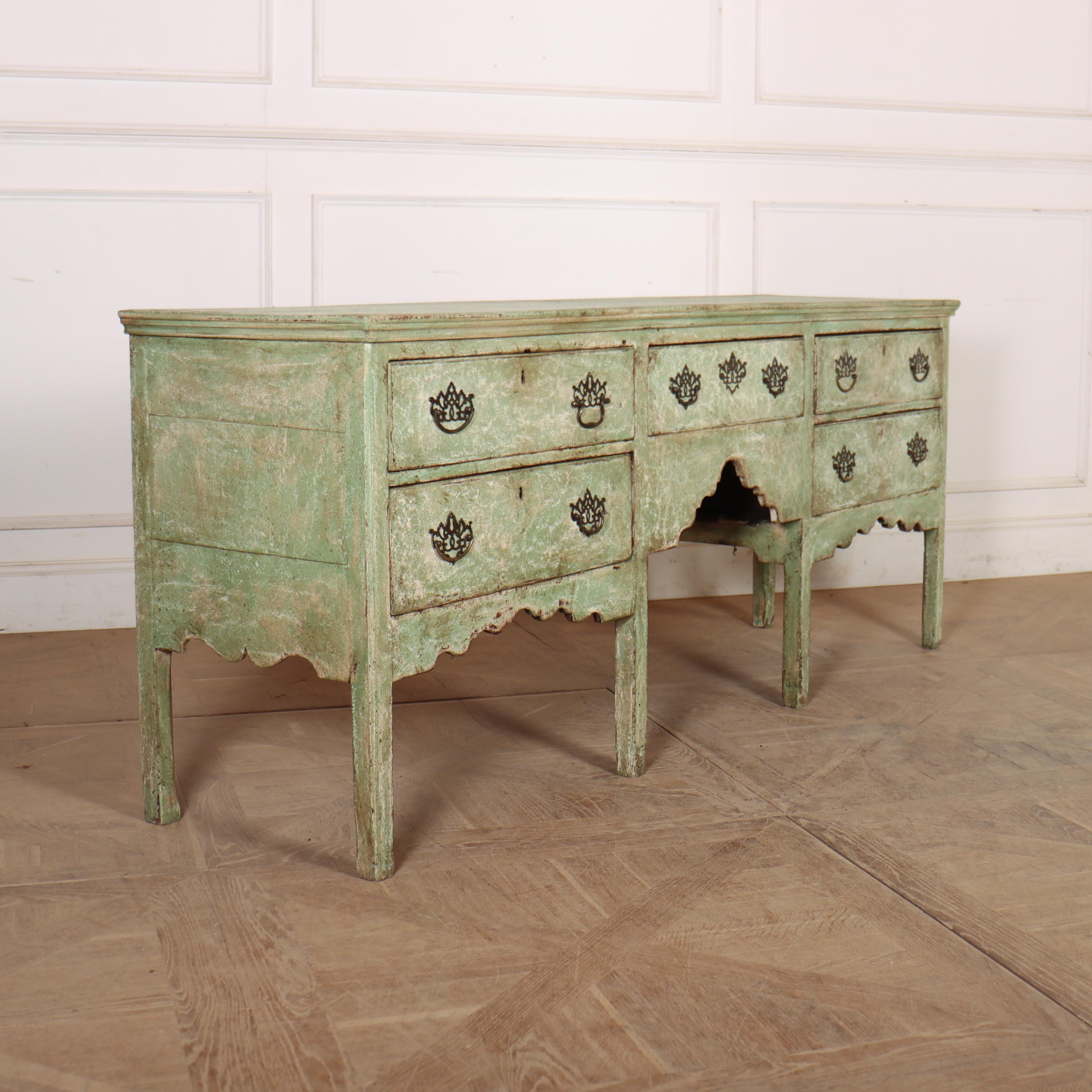 18th Century English 5 drawer dresser base with later scraped green/ old white paint. 1770