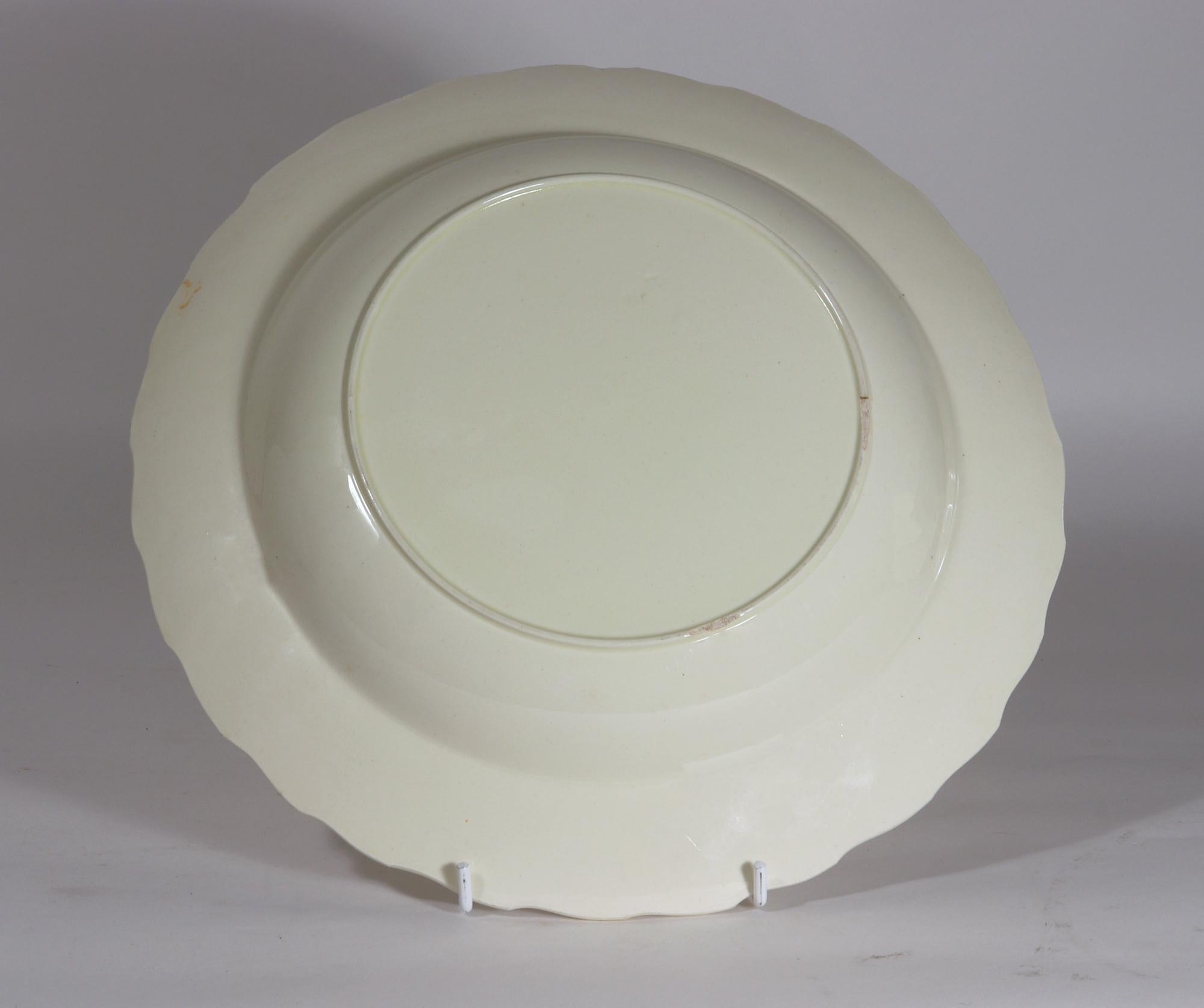 English Plain Creamware Pottery Feather-edge Soup Plates,
Set of Six,
Circa 1785

The set of six creamware large soup plates are in plain creamware with a lovely rich cream colour with a deep central bowl   The borders with a continuous feather-edge