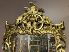 18th Century English Rococo Wall Mirror with Scroll Carved Giltwood Frame