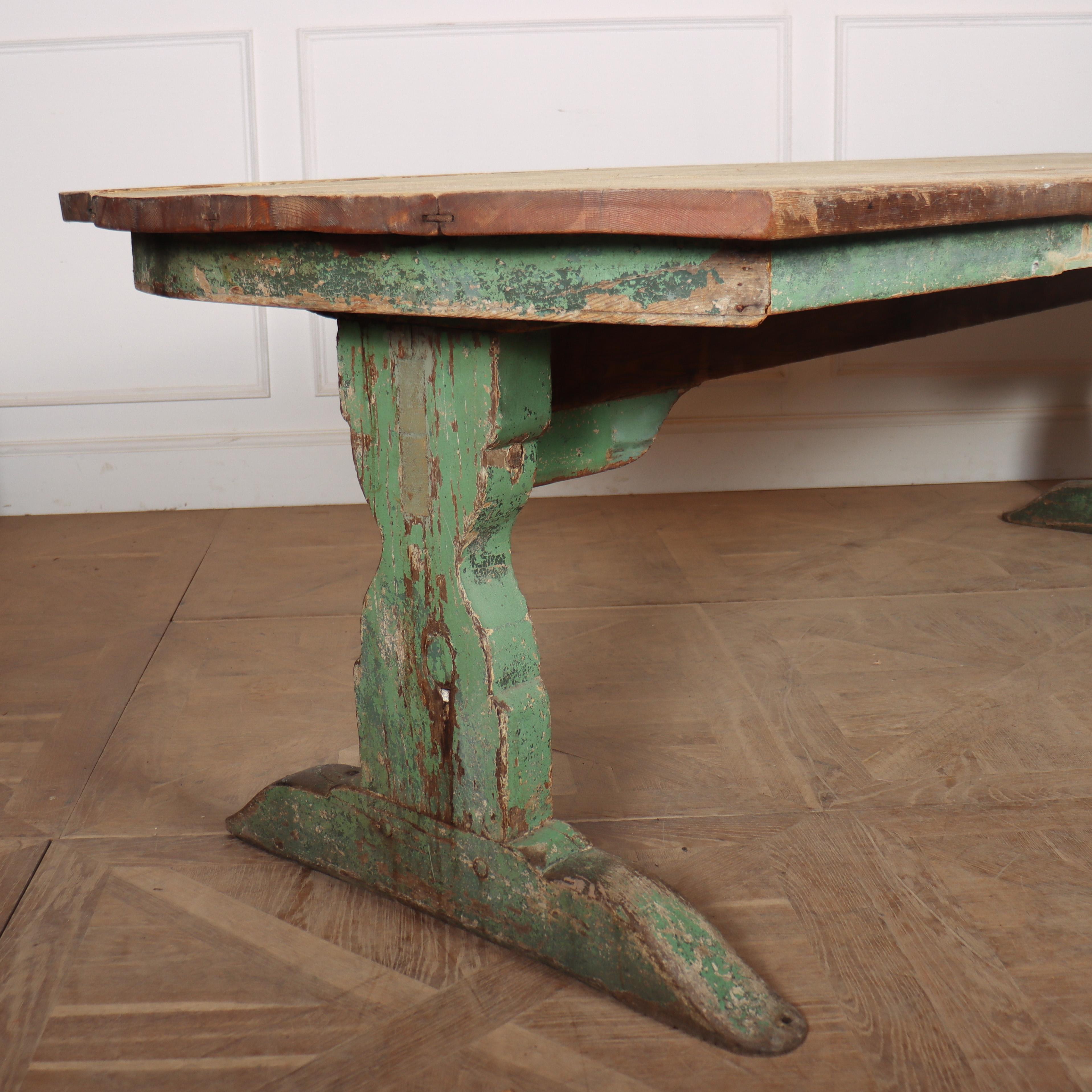 Wonderful late 18th C English trestle table with an original painted finish and bowed ends. 1780.

Clearance is 25.5