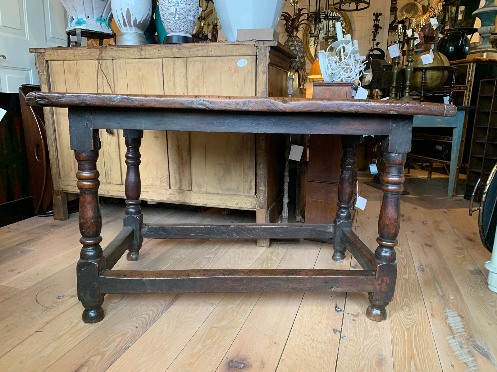 18th century English walnut hall table with four sided stretcher.