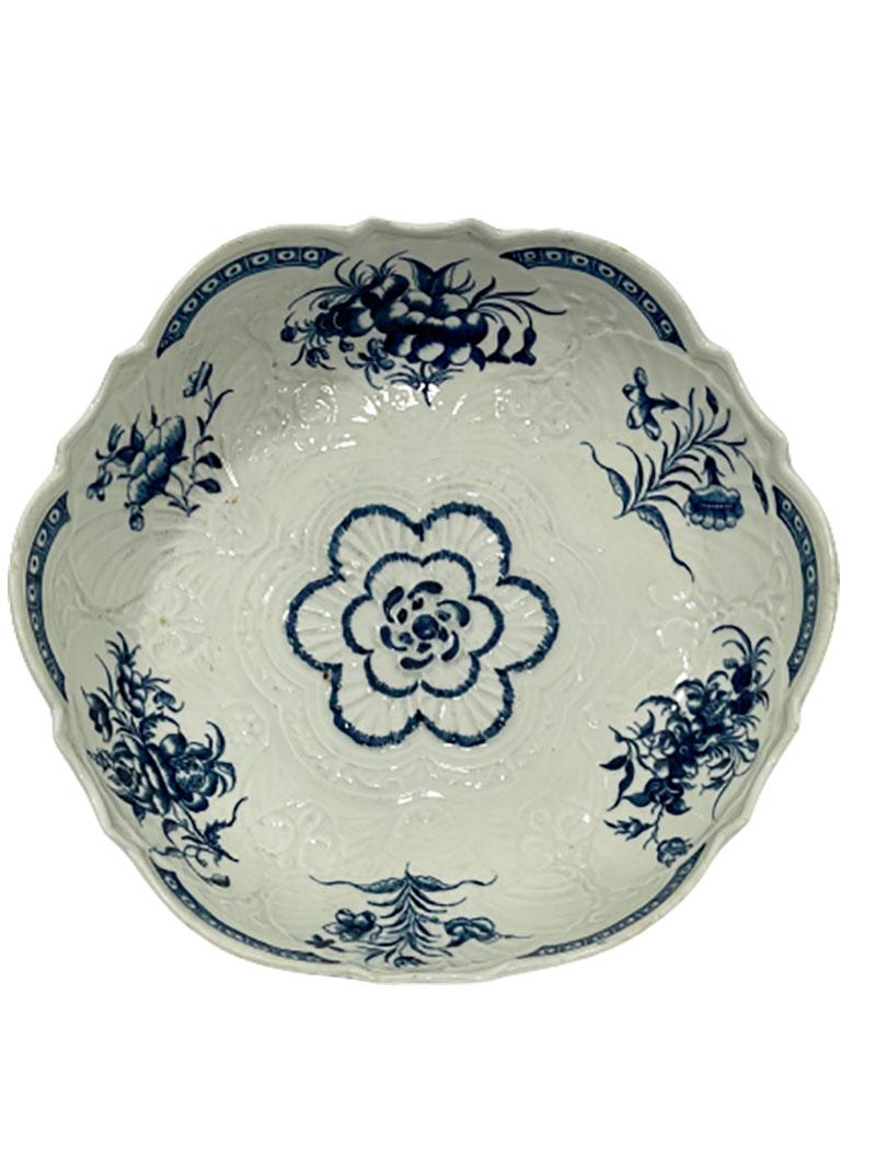 18th century English Worcester bowl

Royal Worcester was established in 1751 by John Wall, this bowl is made during so called the Dr. Wall period 
The bowl is marked on the bottom with the crescent (1755-1790)

The bowl has flower pattern and