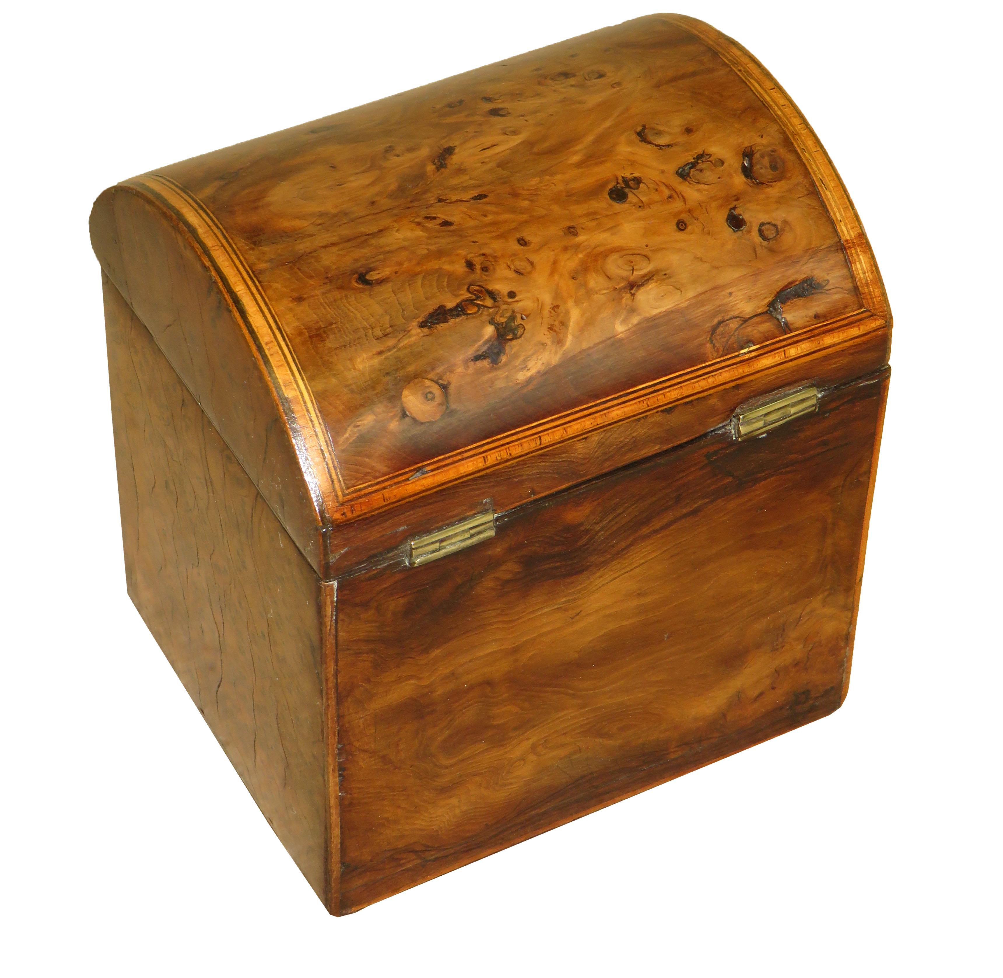 A delightful late 18th century George III period burr
yew wood tea caddy having domed lid and crossbanded
decoration with fully working lock and key.

(Tea caddies were used to both preserve the tea leaves, but also
to lock it away and protect