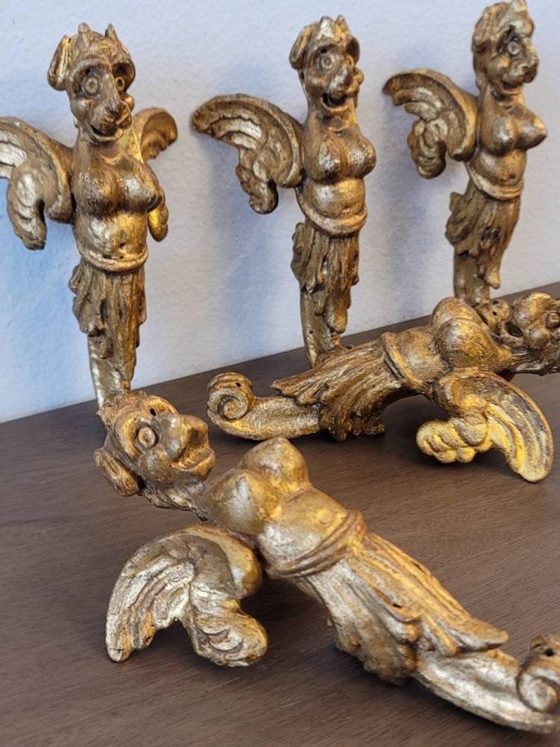 An antique Baroque period European Medieval style six piece collection of rare and most unusual hand carved giltwood architectural elements with beautiful rich patina. circa 1700s 

Born in the 18th century or possibly earlier, most likely Italian