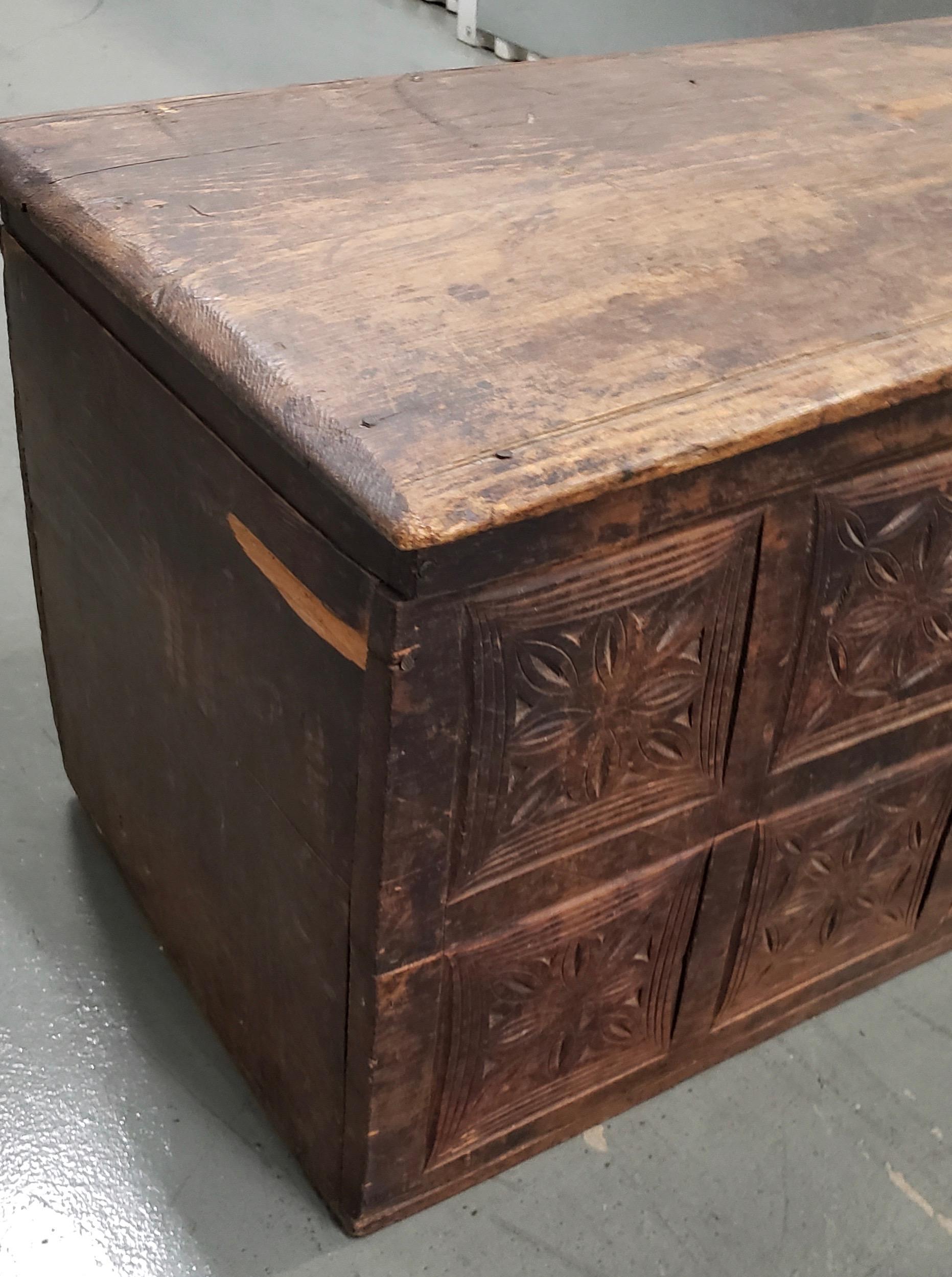 18th century European carved pine trunk

Brilliant antique trunk / blanket chest from Europe. This can also be used as a toy chest, games chest, linen chest, etc.

The chest measures 33
