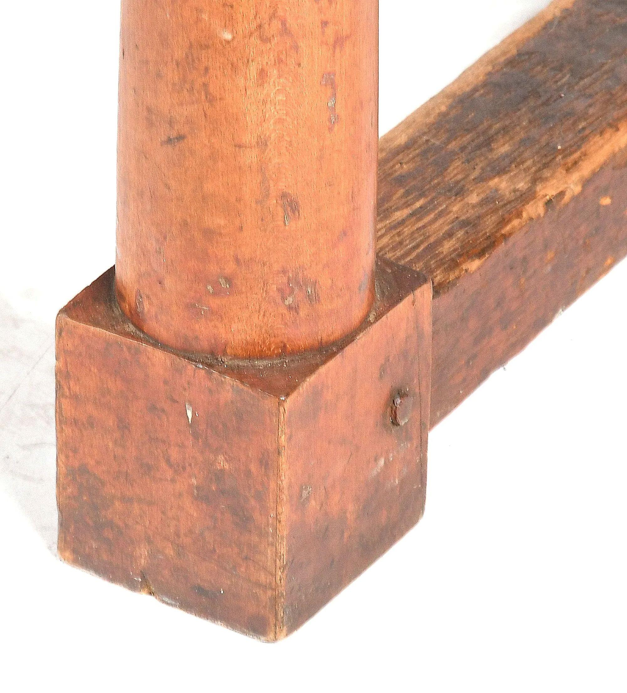 An rare surviving 18th century American farm table, crafted with a pine top over a maple base, exemplifying the craftsmanship of the late colonial to early Federal period. The rectangular top is formed of two wide pine plants with warm, well-worn