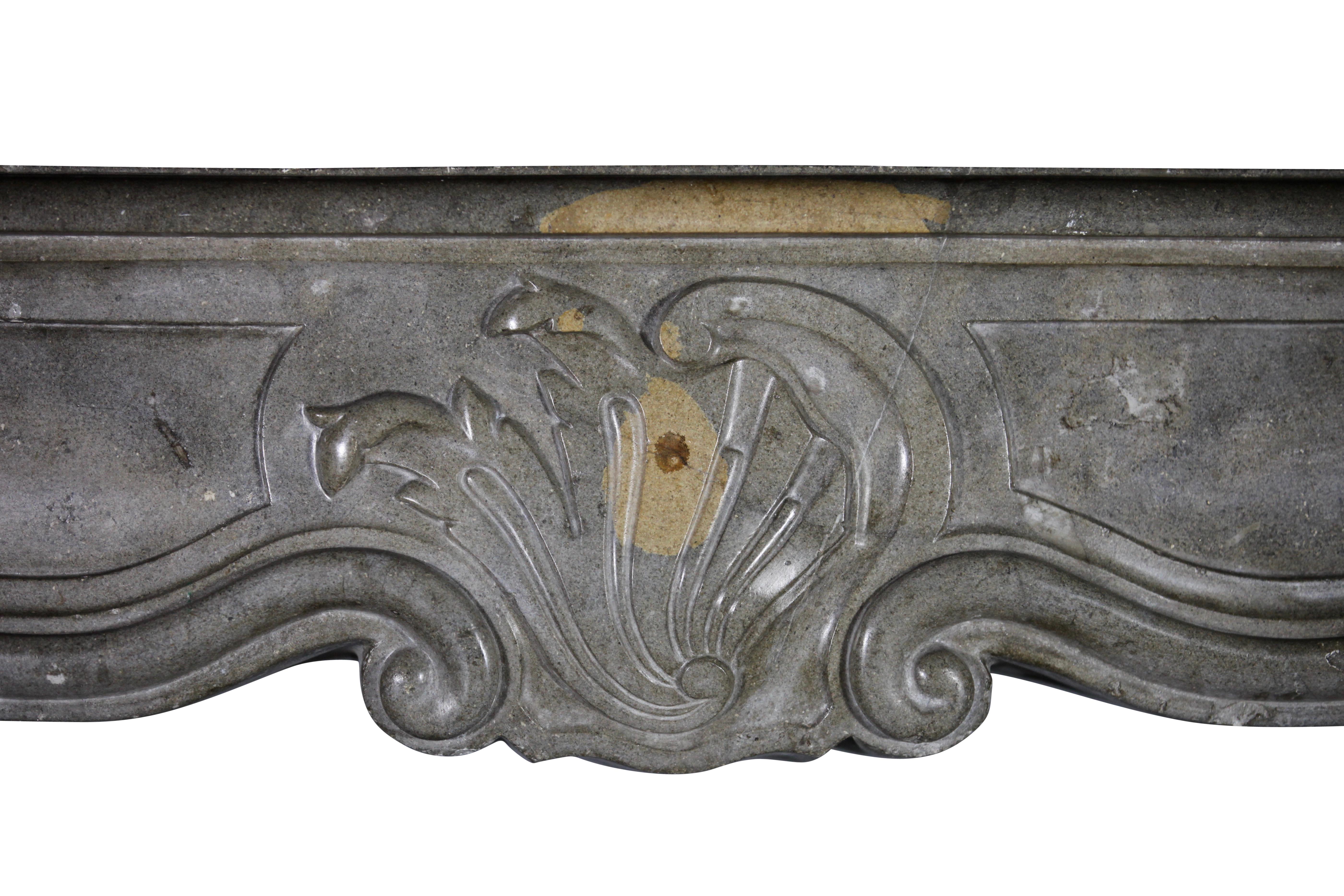 This is a original antique fine French Regency fireplace surround in a burgundy bicolor marble hard stone. This is a grand antique fireplace mantel.
Measures:
181 cm EW 71.25