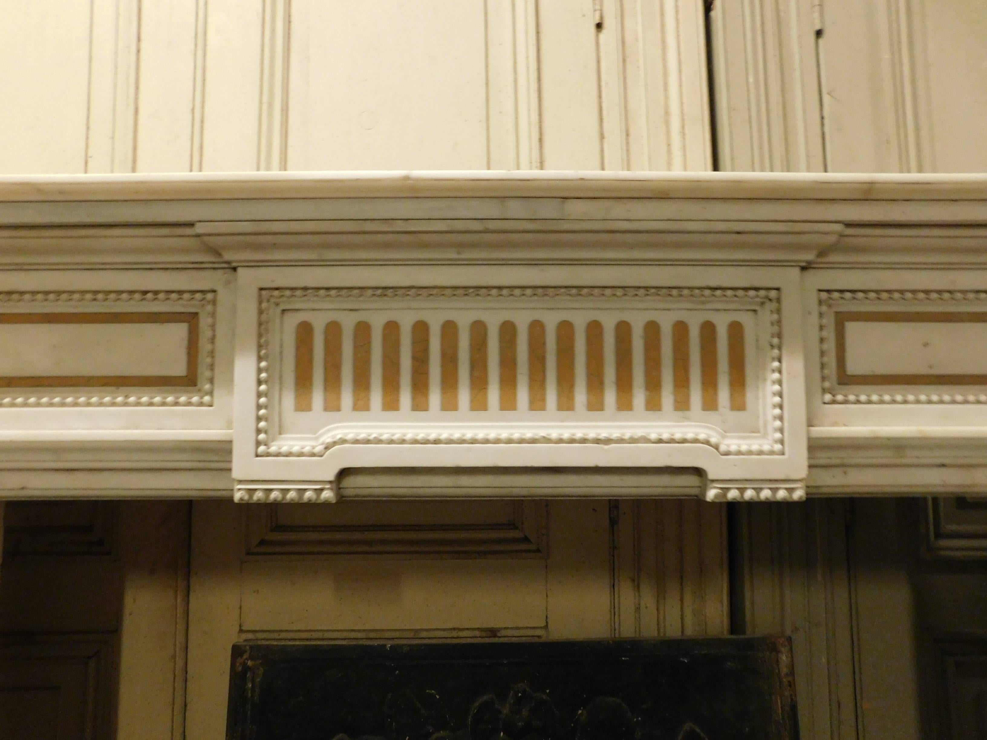 18th century fireplace made of Carrara Michelangelo marble and giallo Siena.
