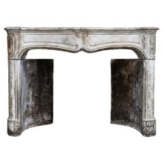 Antique 18th Century Fireplace of French Limestone in the Style of Louis XV