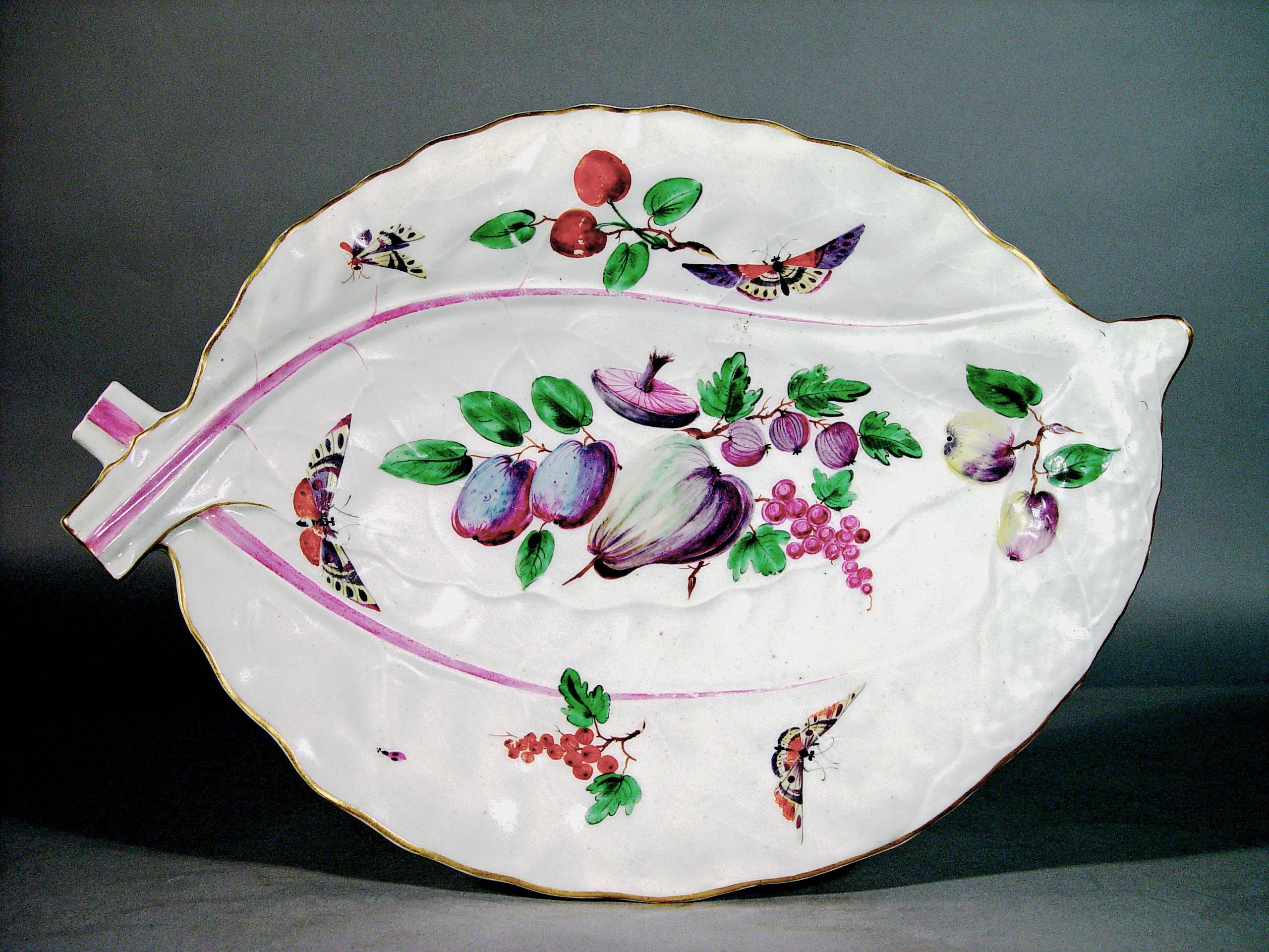 First Period worcester porcelain large leaf dish, 
London decorated probably painted by James Giles
Circa 1770.

This molded First Period Worcester porcelain overlapping leaf dish was possibly decorated by the famous London painter, James Giles.