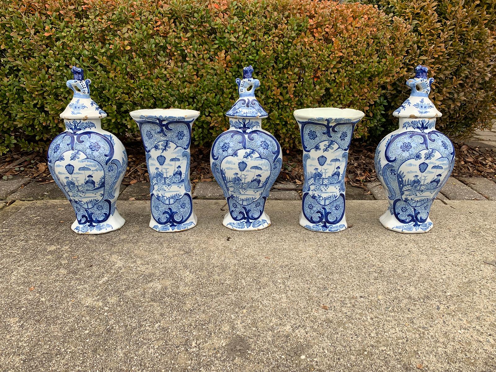 19th century five-piece delft-style blue and white porcelain garniture, all marked
Measures: Lidded jars: 6