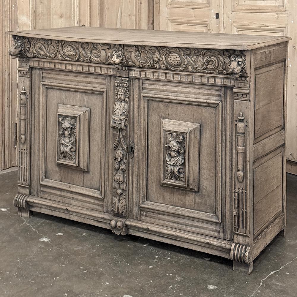 18th Century Flemish Renaissance Buffet is a lively piece, commissioned by a wealthy patron who wanted a bit of whimsy in its character!  Abundant symbolism abounds in the carved embellishment of the piece, sculpted in glorious full relief for all