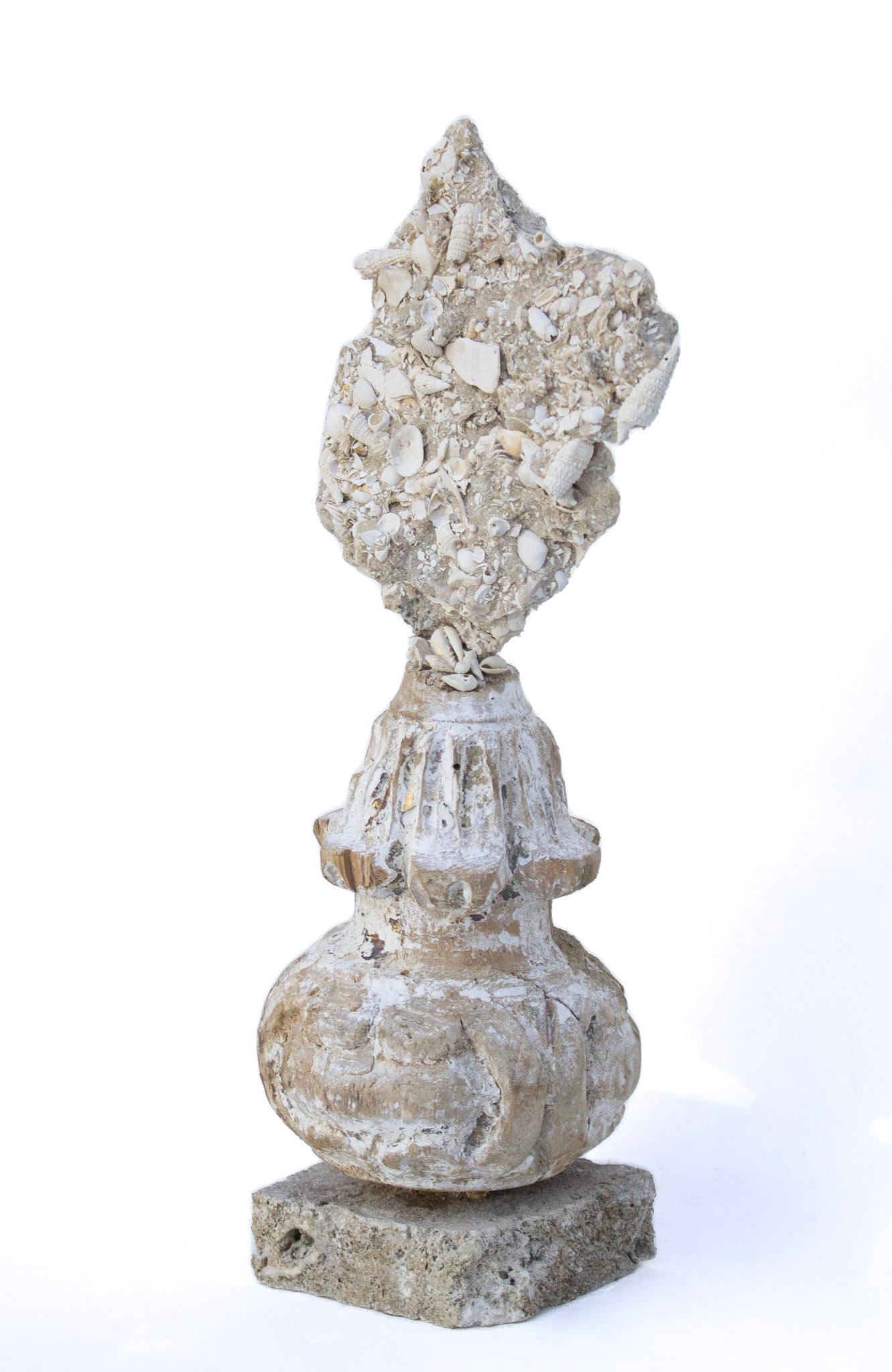 18th century Italian 'Florence Fragment' base topped with a variety of fossil shells in matrix and mounted on a rock coral base.

This fragment is from a church in Florence. It was found and saved from the Florence Flood of 1966. The fragment still