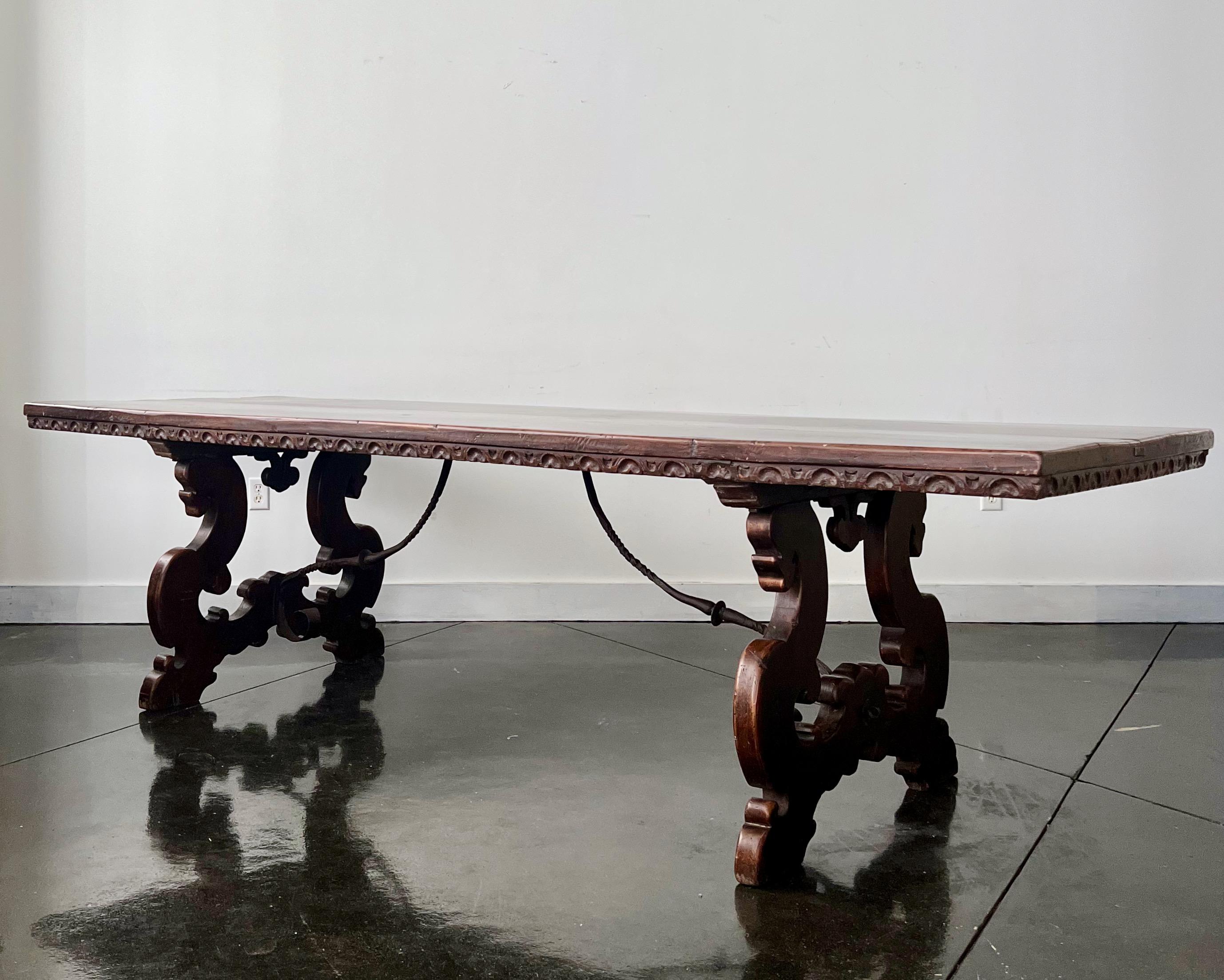 Hand-Carved 18th Century Florentine Italian Walnut Dining Table with Iron Stretcher  For Sale