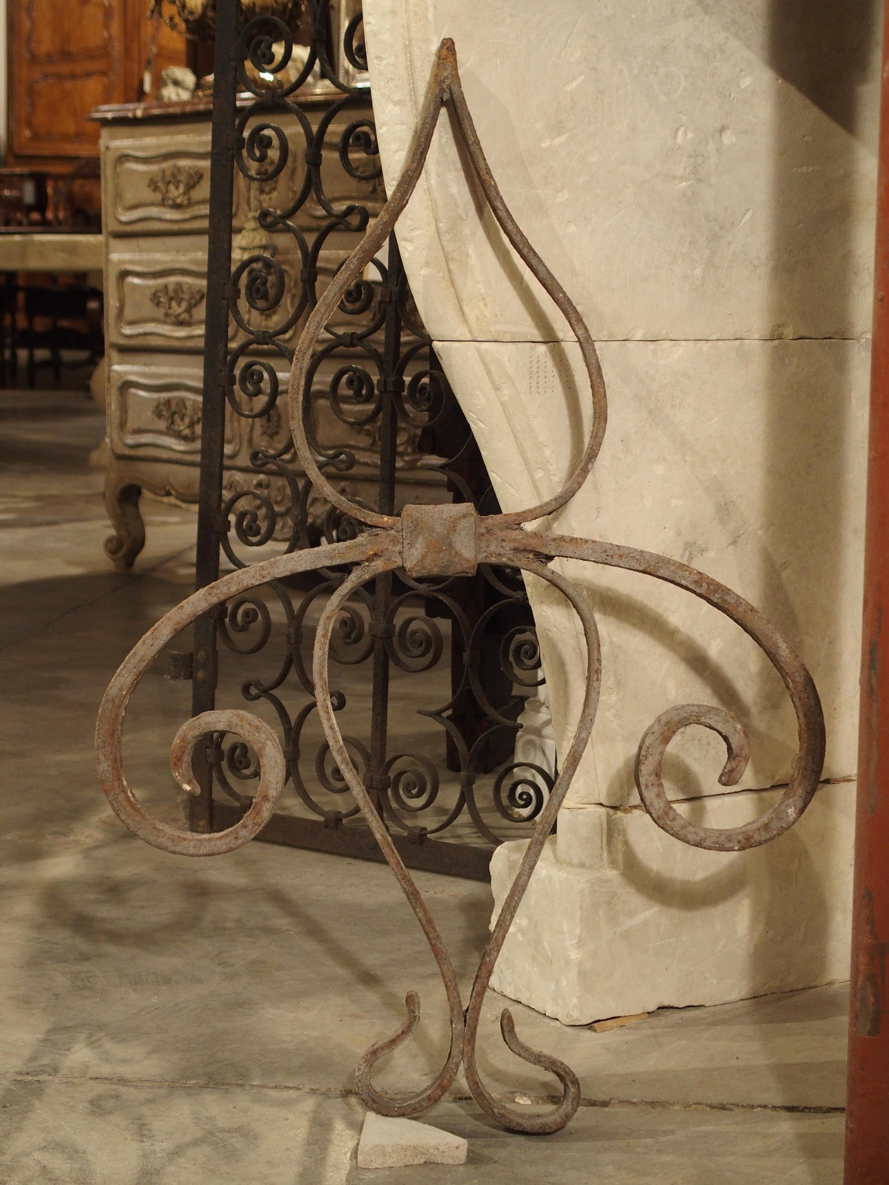 French 18th Century Forged Iron Fleur De Lys Ancre Wall Support from France