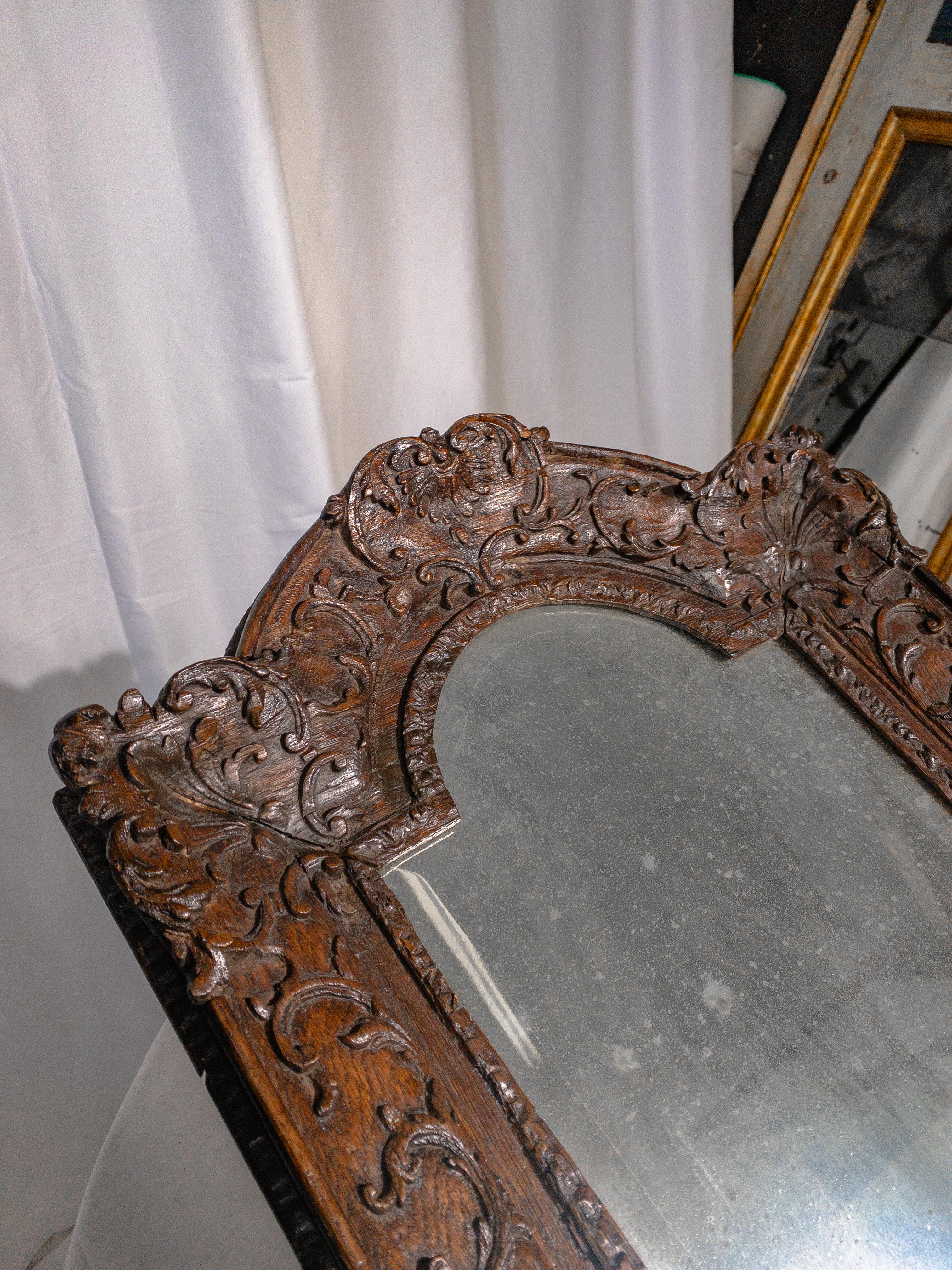 18th Century Foxed Mirror in Carved Wooden Frame In Good Condition For Sale In Houston, TX
