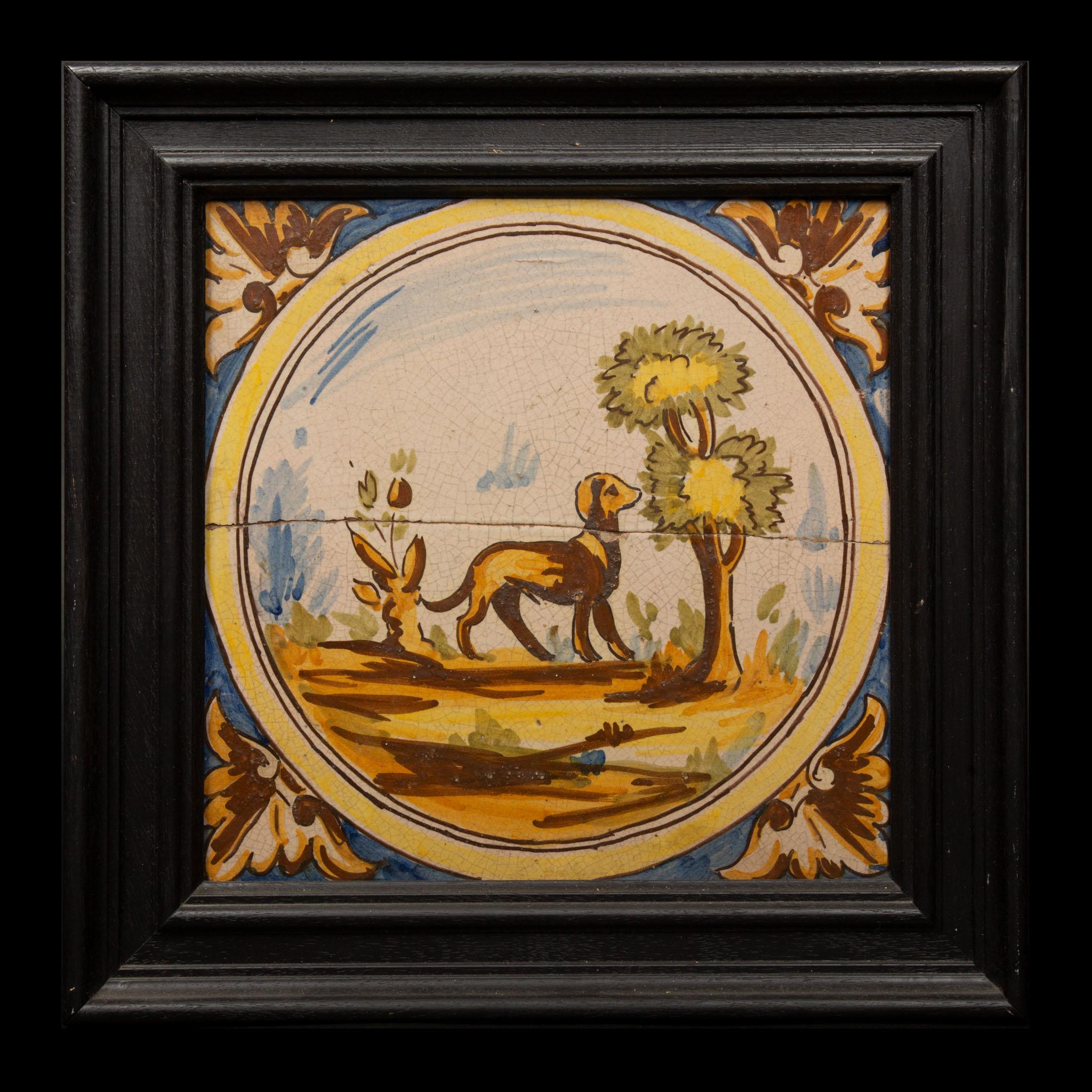 Azulejos holandeses de Delft del siglo XVIII enmarcados que representan a un cazador y sus perros Holandés