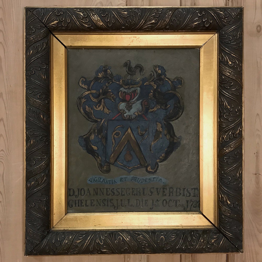 18th Century Framed Family Crest oil painting on canvas is a wonderfully well preserved work in part because of the lavish frame that was added to protect it during the late 19th century. Such family crests were of extreme importance to nobles and