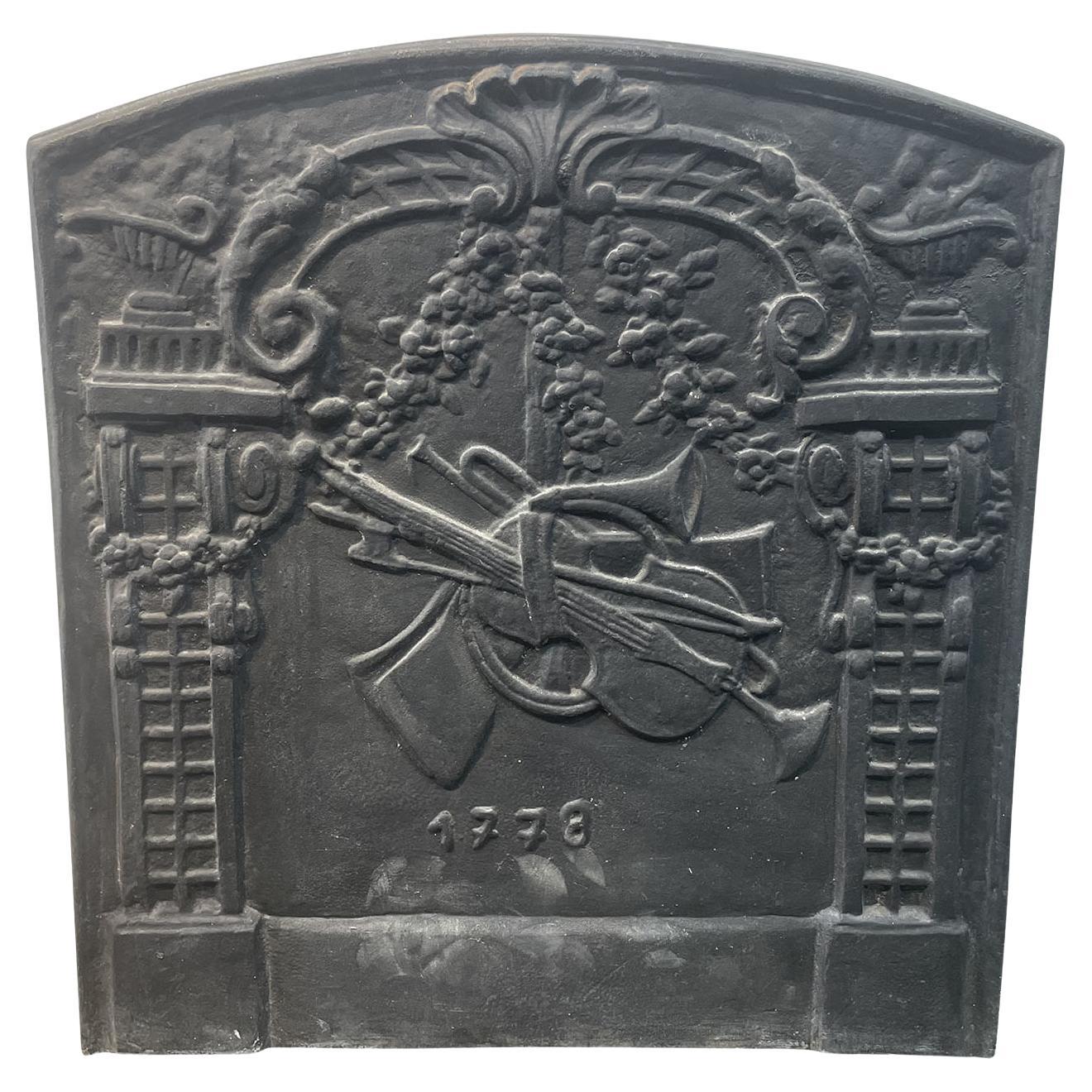 18th Century French Antique Cast Iron Megeve Fireback For Sale