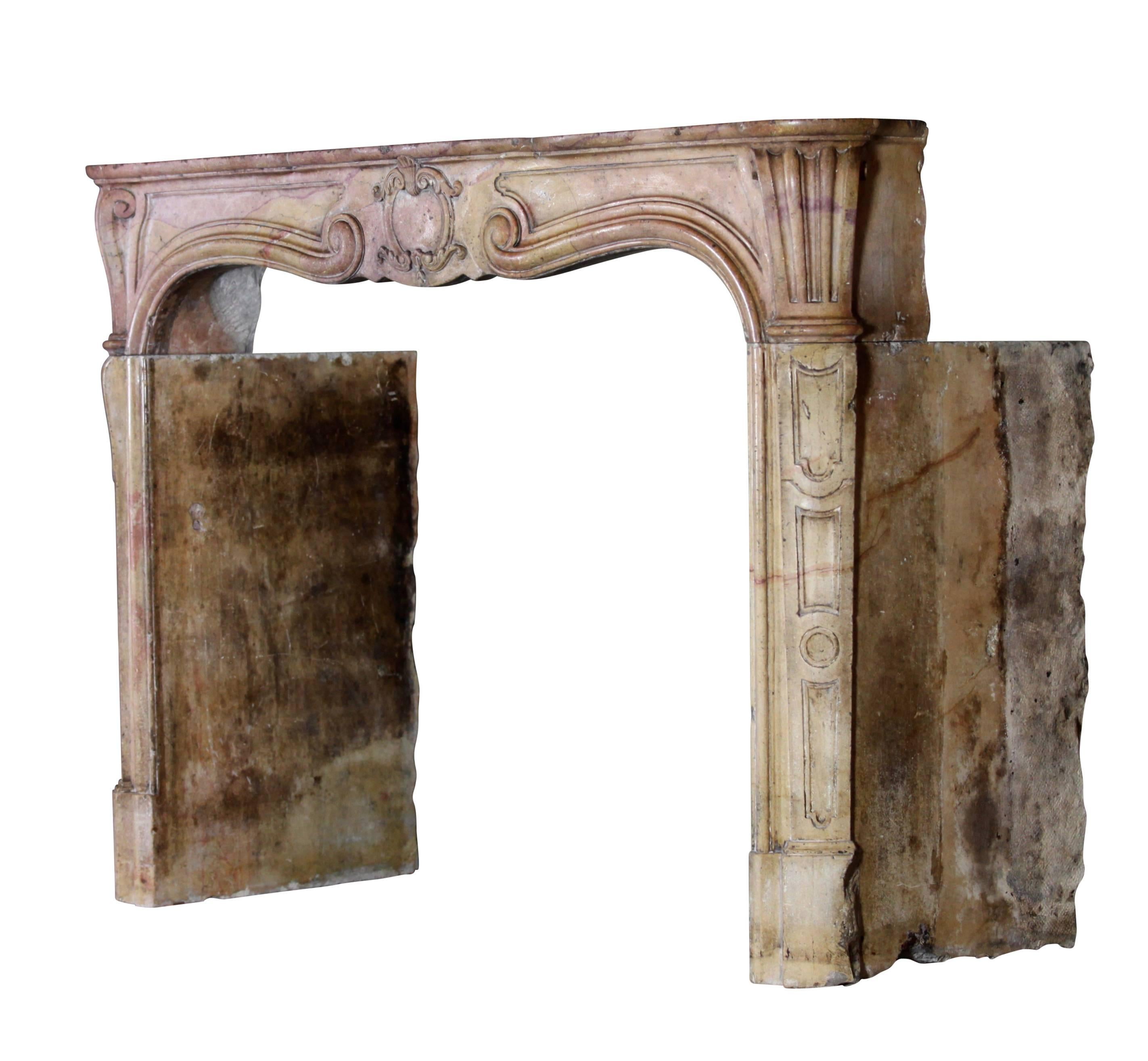 Louis XIV 18th Century French Antique Fireplace Surround in Stone Out of a Panel Room For Sale