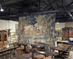 Tapisserie française d'Aubusson du XVIIIe siècle représentant une verdure et un paysage de château