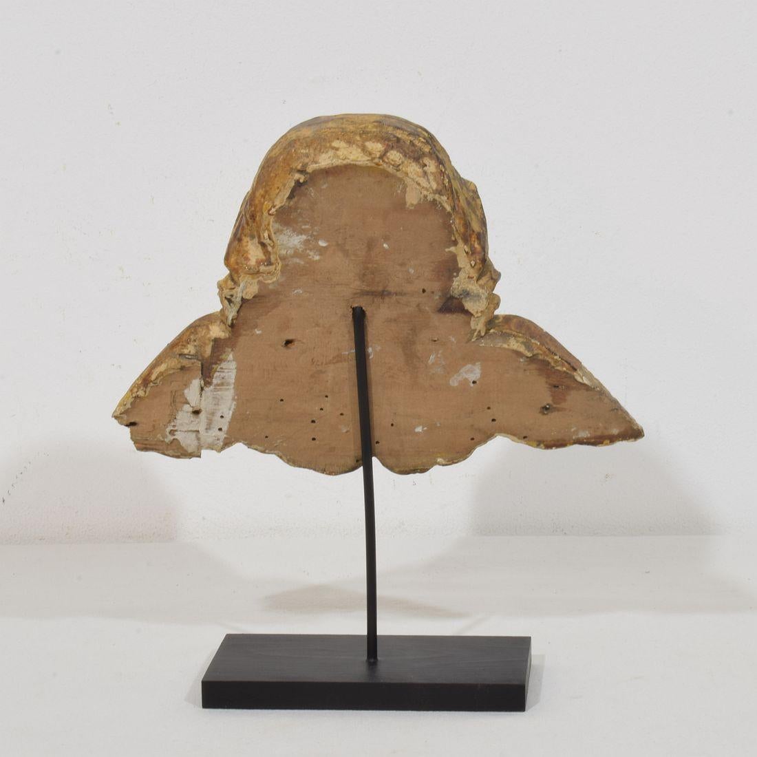 Doré Tête d'ange en bois doré sculpté du XVIIIe siècle, de style baroque français en vente