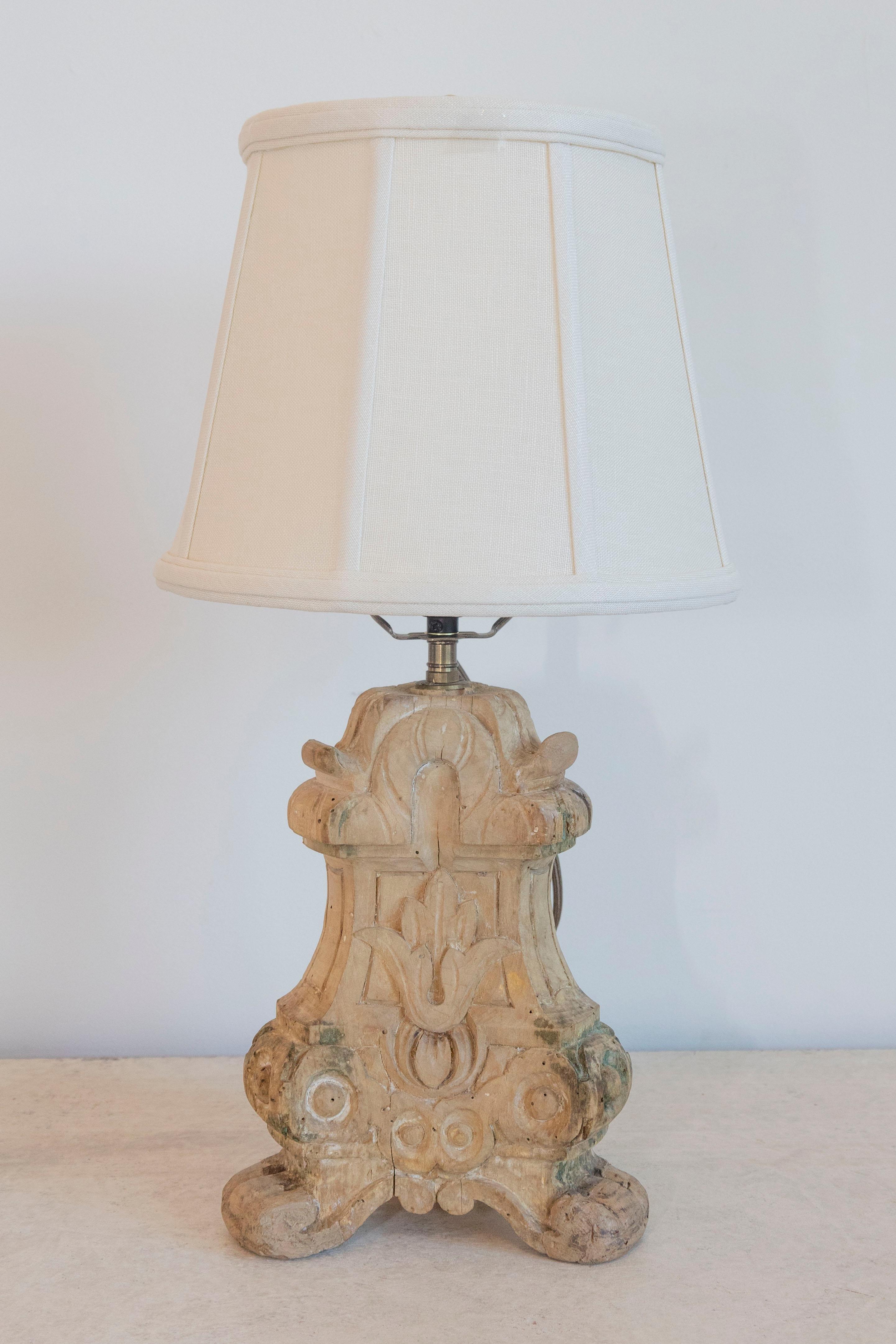 This exquisite 18th-century French lamp showcases masterful craftsmanship and timeless design. Originally a carved wooden architectural element, this piece has been beautifully repurposed into a lamp, embodying both history and functionality. The