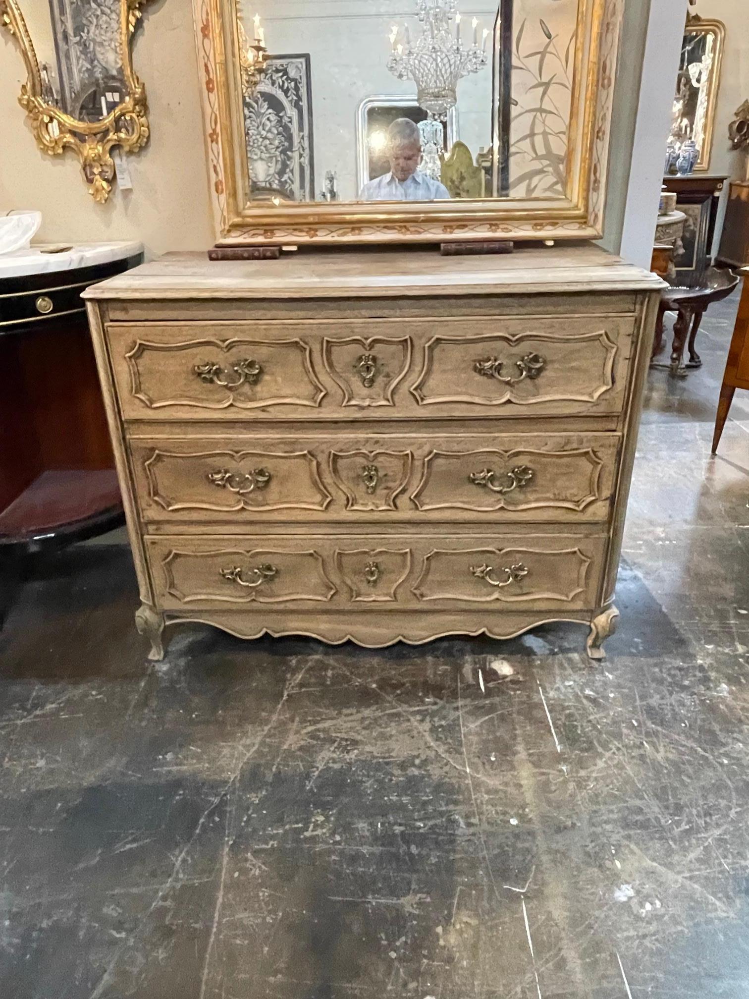 18th century French carved and bleached oak commode. Circa 1780. Adds warmth and charm to any room!