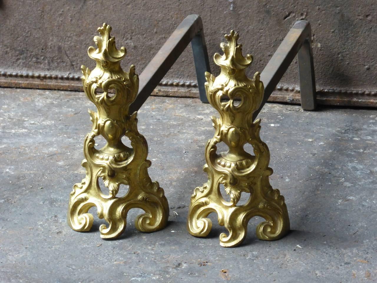 18th century French andirons made of ormolu and wrought iron. The andirons are made by Bouhon Frères. Bouhon Frères were prominent French producers of fireplace tools. The firm participated in the 1878 and 1900 Paris Expositions Universelles.

One
