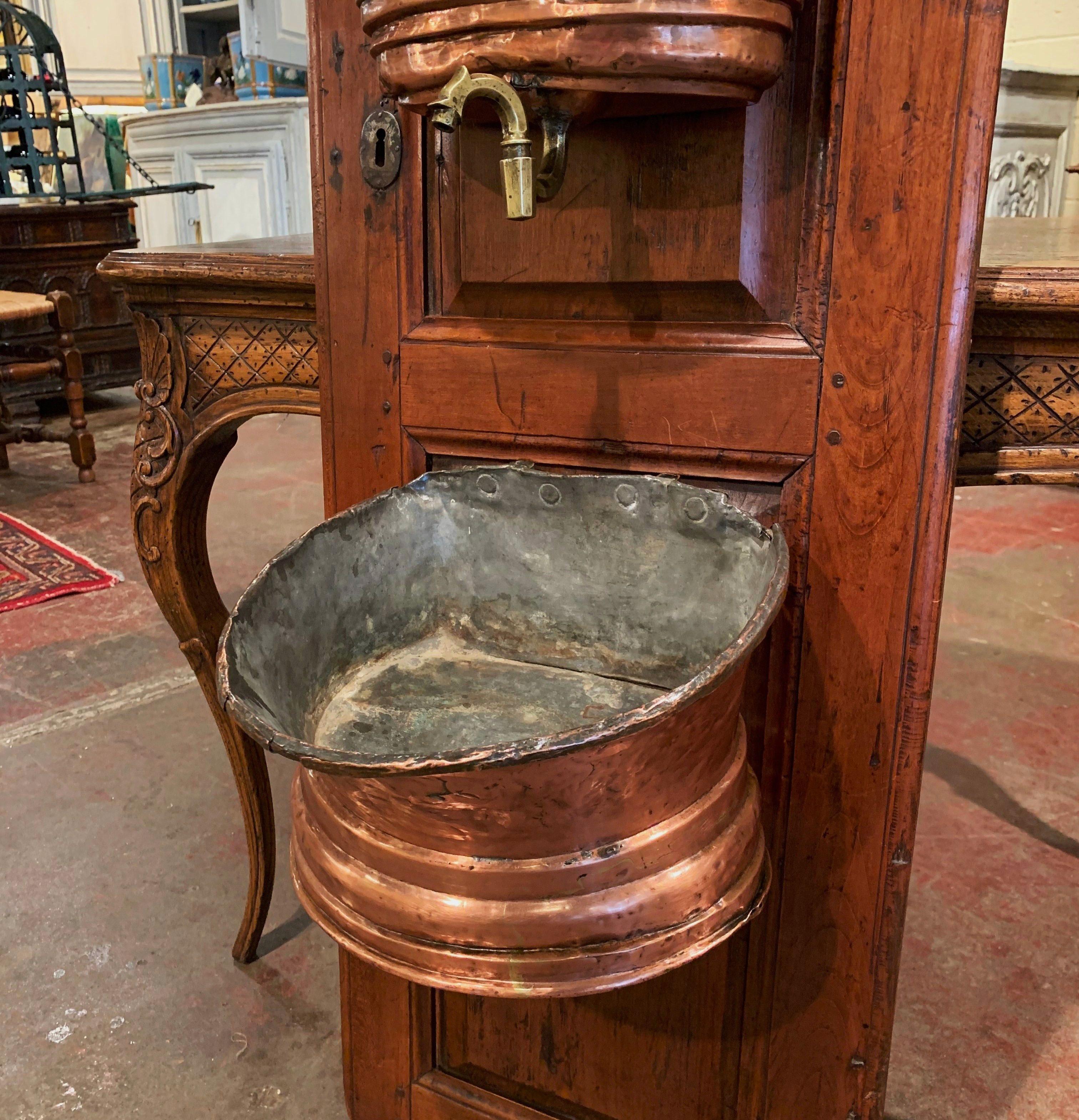 Hand-Carved 18th Century French Brass Lavabo Fountain from Normandy on Carved Cherry Door For Sale