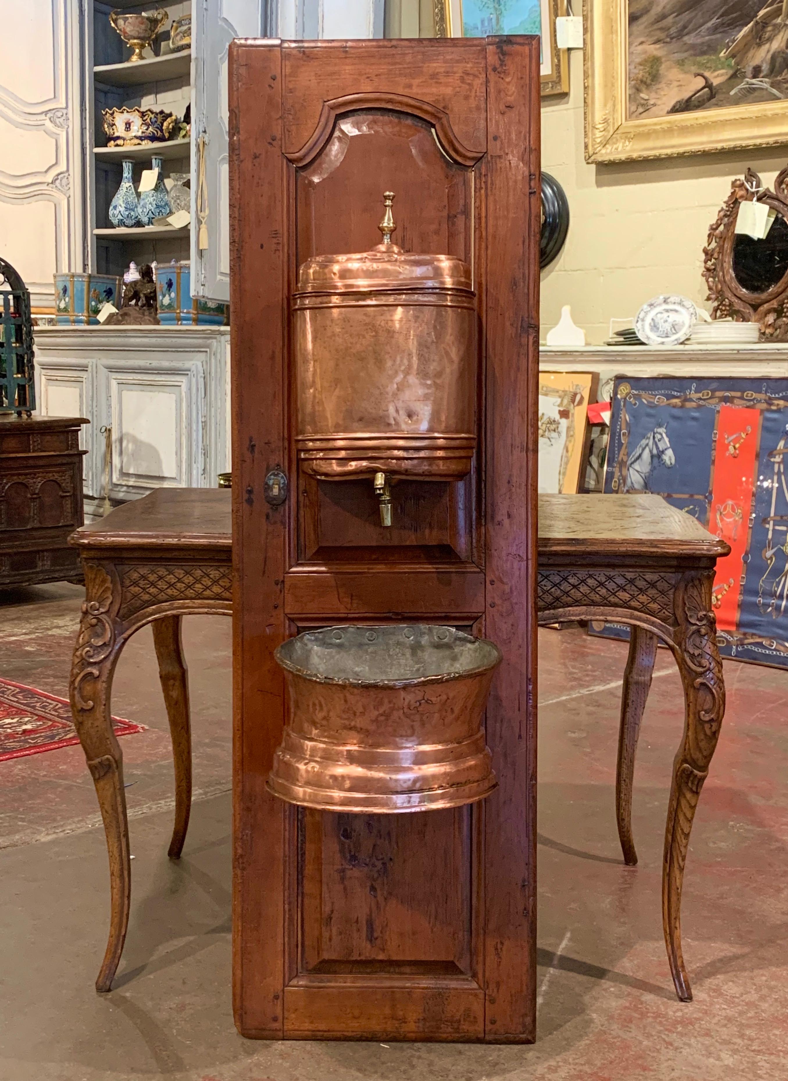 18th Century French Brass Lavabo Fountain from Normandy on Carved Cherry Door In Excellent Condition For Sale In Dallas, TX