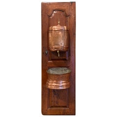 Used 18th Century French Brass Lavabo Fountain from Normandy on Carved Cherry Door