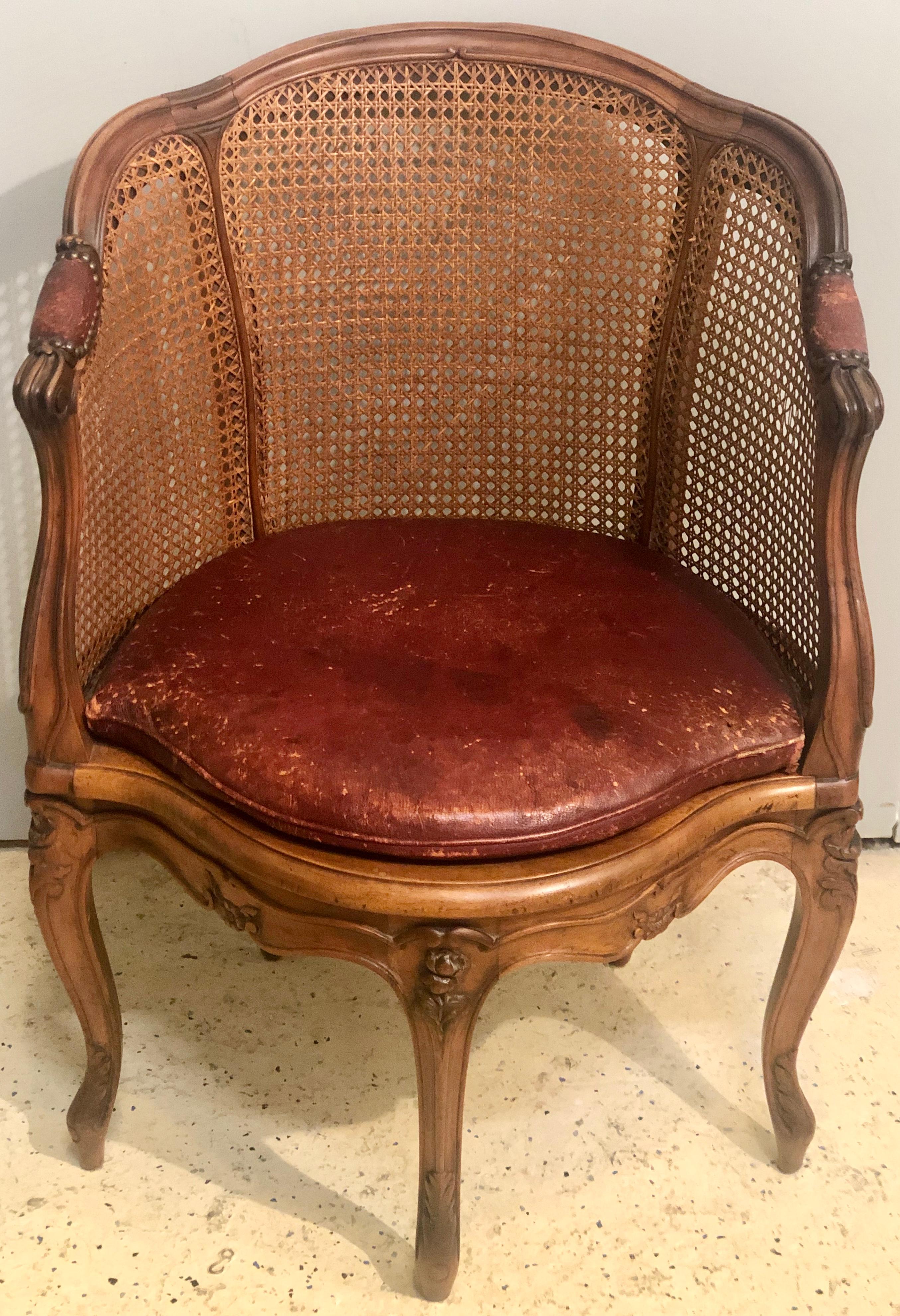 18th century French caned bergère de Bureau. A Louie XV beechwood bergère de Bureau with leather squab cushion, circa 1740. Magnificently carved. One of two presently available.

Please see:
Sale #18793
The collector: Property from Four American