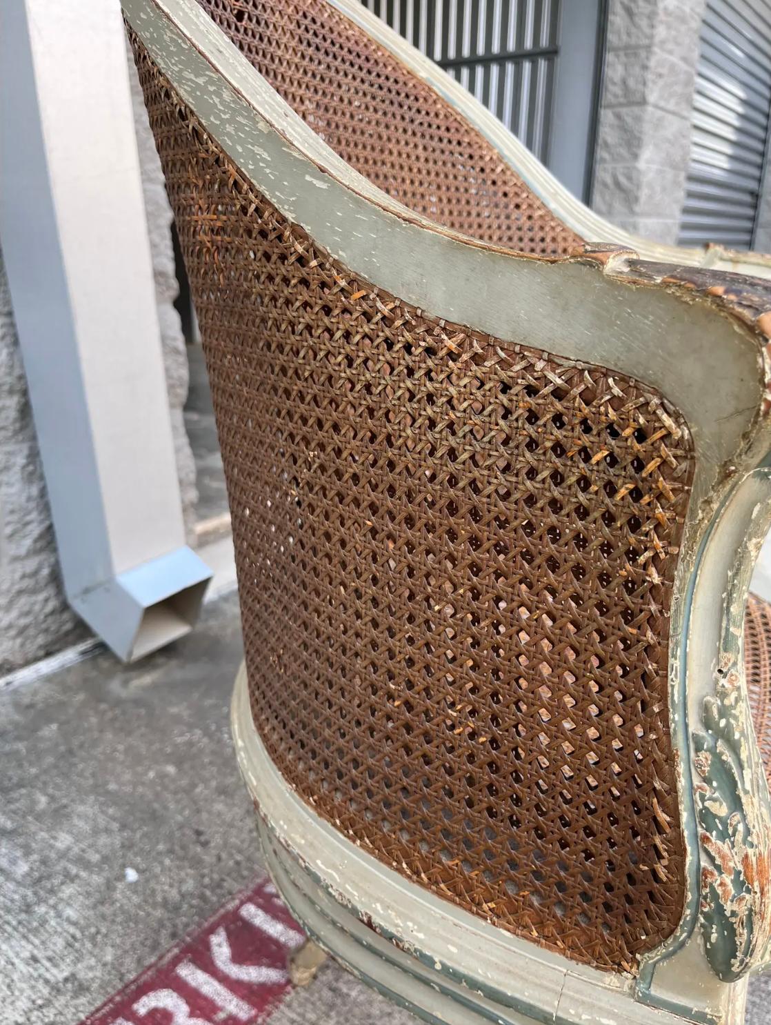 This exquisite 18th-century French caned chair is a rare blend of elegance and craftsmanship. Designed as a versatile desk or corner chair, it features a gracefully curved silhouette with delicate hand-carved details that highlight its refined form.