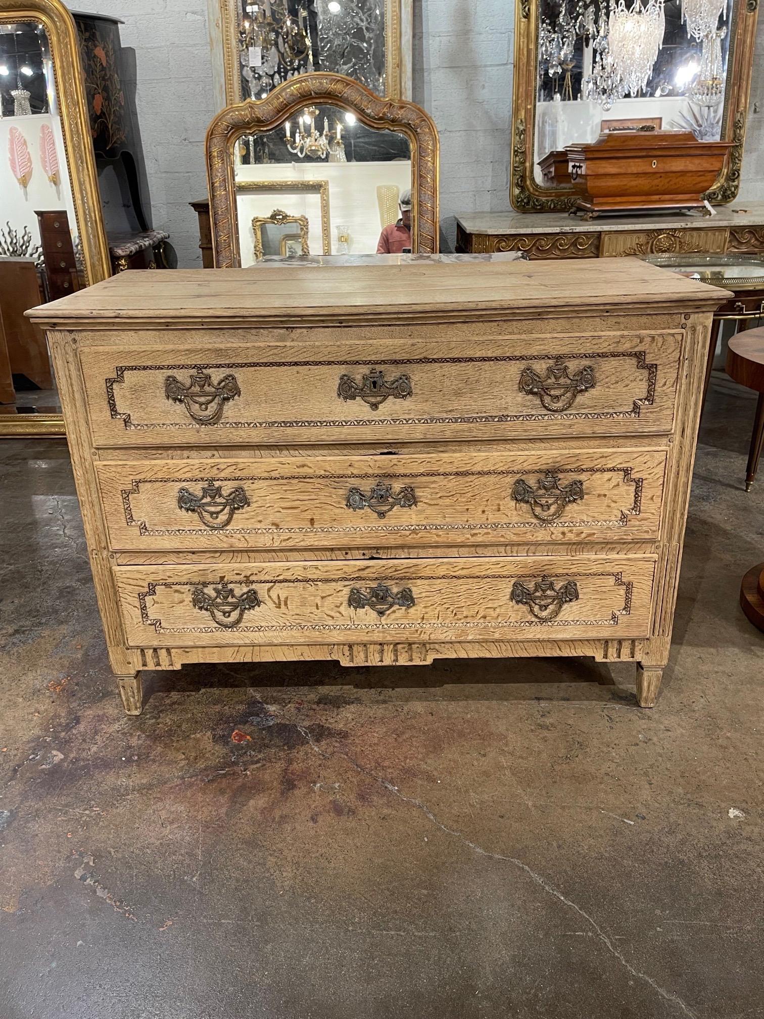 Very nice 18th century French carved and bleached white oak commode. Lovely patina and tons of storage. Great for the modern farmhouse look!.