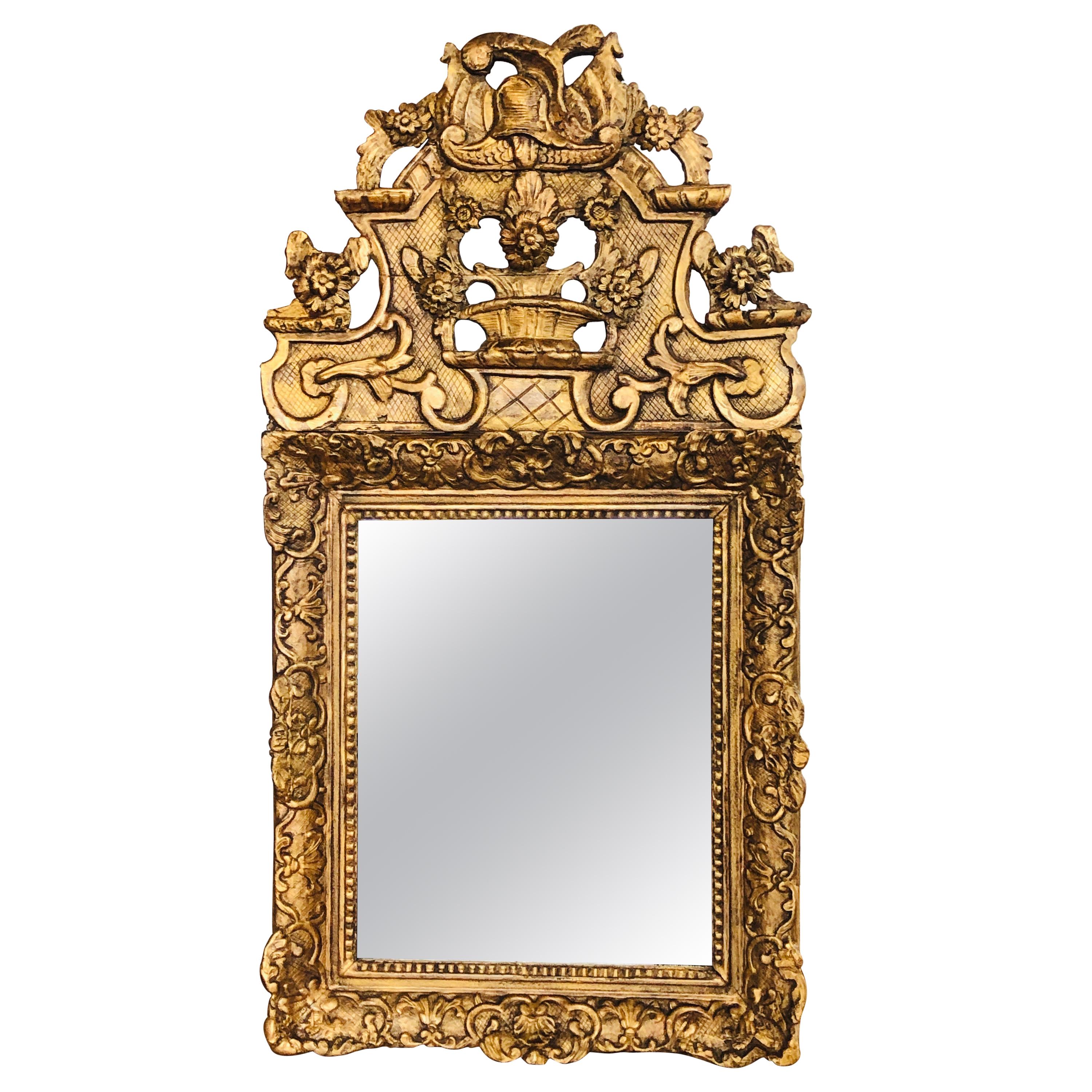 18th Century French Carved Giltwood Mirror with Rich Decoration For Sale