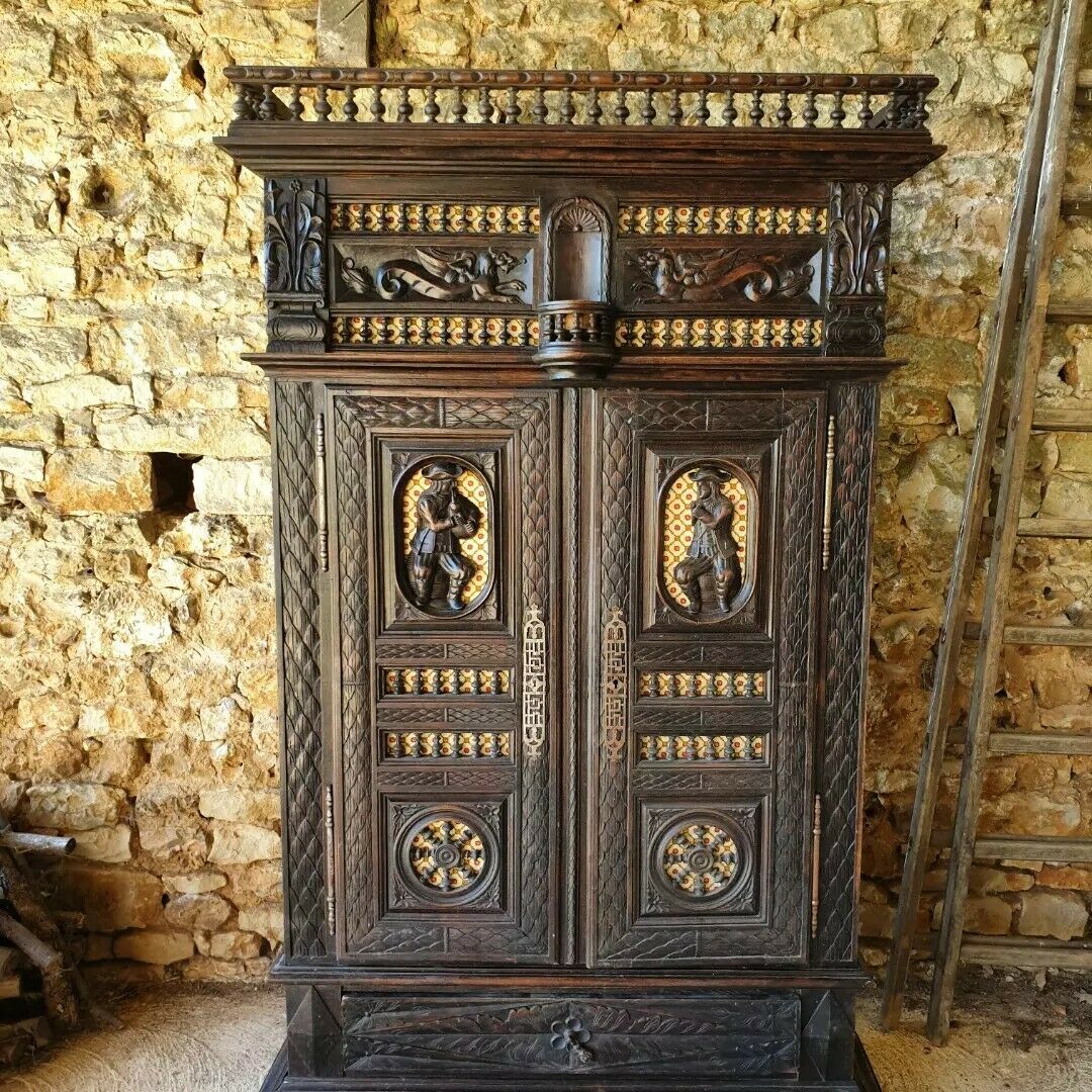 This Fantastic heavily Hand Carved Breton armoire, is a fabulous piece of history, dated from the late 18th Century. The Dark Oak is carved with Nautical scenes, Dragons and Floral Motifs depicting the Brittany area in France in days gone by.

The