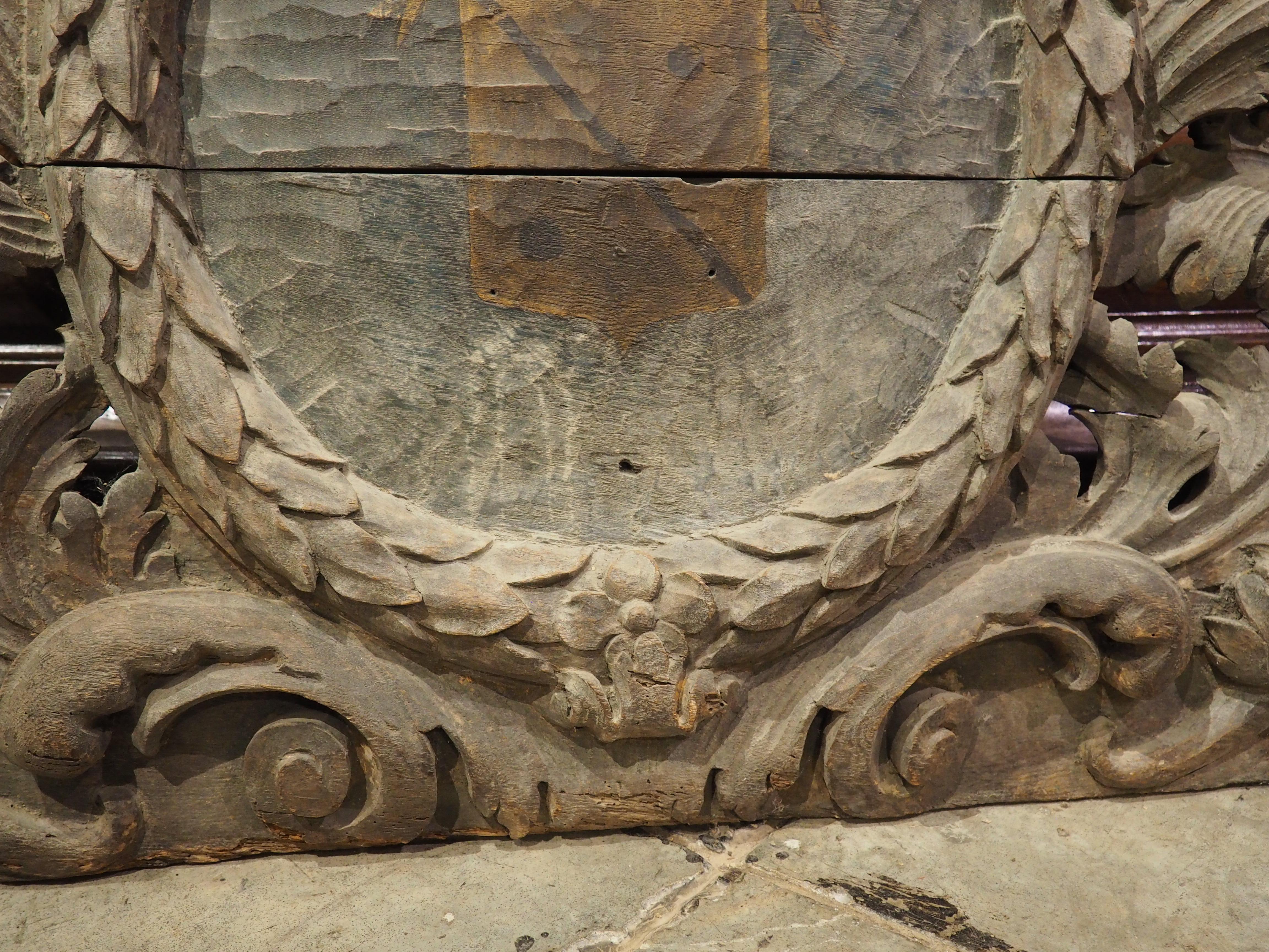 Wood 18th Century French Carved Oak Chateau Overdoor with Central Coat of Arms