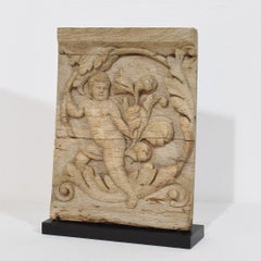 18th Century French Carved Oak Panel Depicting An Angel On An Acanthus Curl
