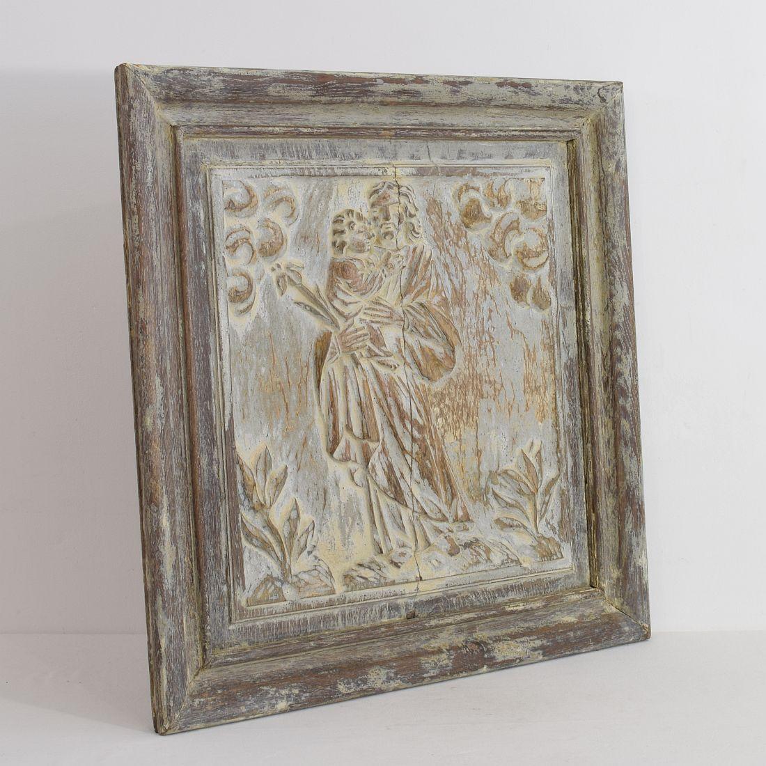 Beautiful weathered oak panel with traces of its original colors.

France circa 1750, weathered small losses.
