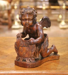 18th Century French Carved Oak Winged Putto with Fleur-de-Lys Heraldic Shield