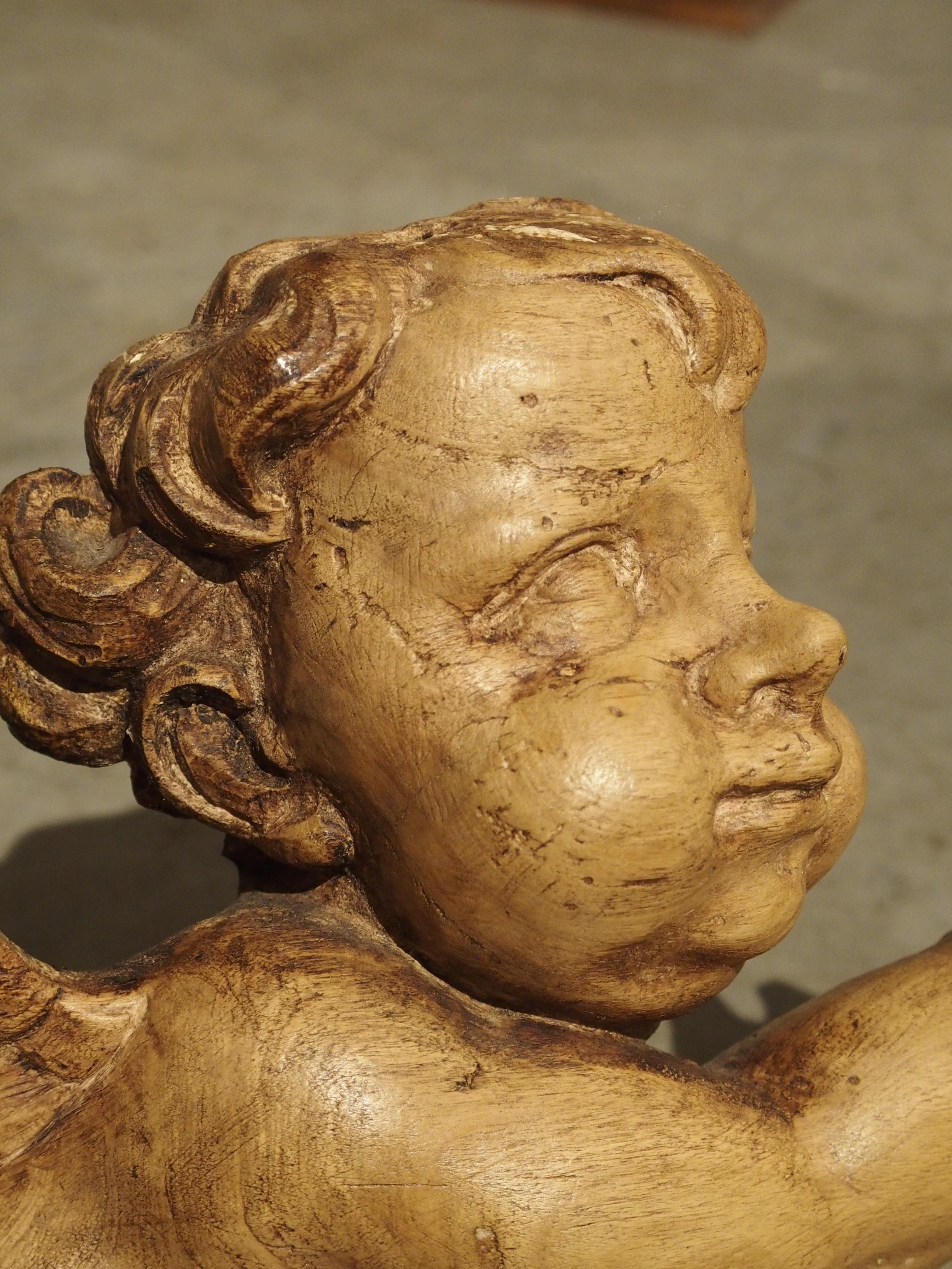 Hand-Carved 18th Century French Carved Sculpture of a Flying Cherub For Sale