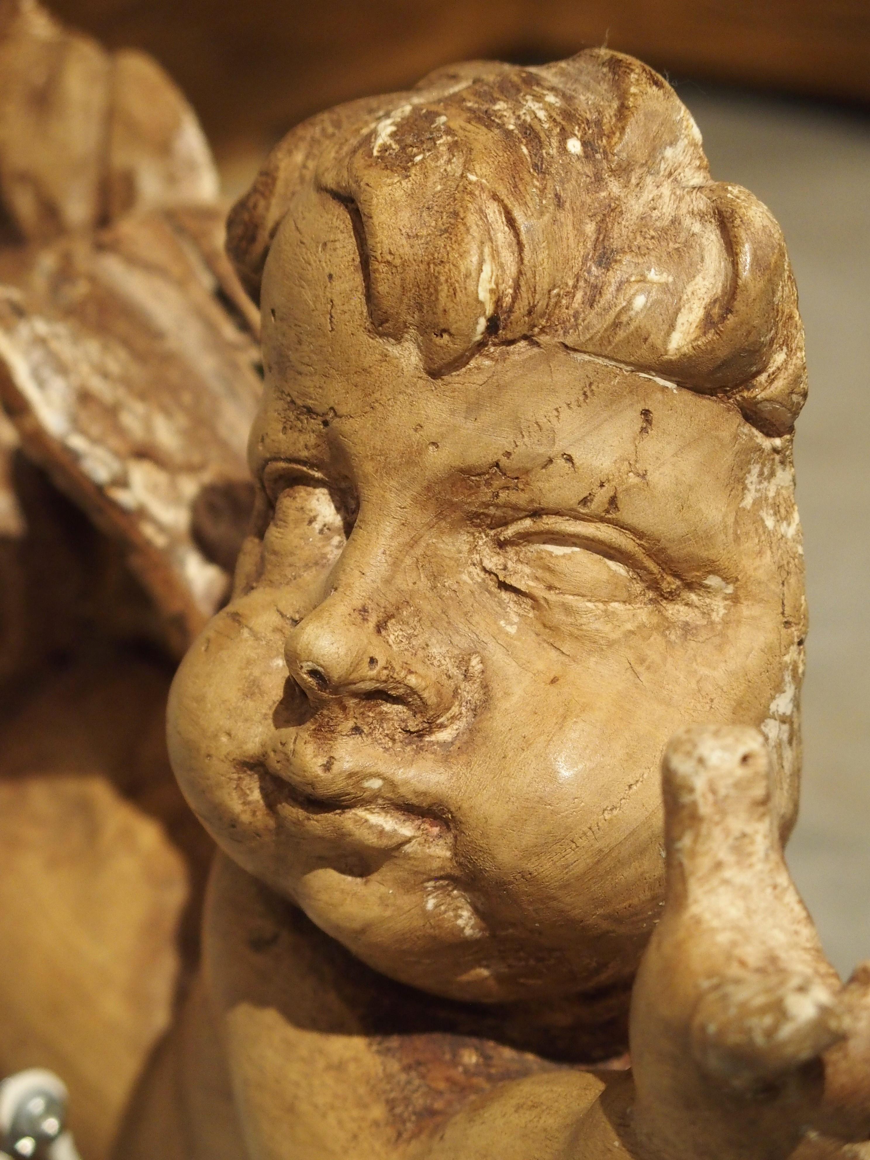18th Century and Earlier 18th Century French Carved Sculpture of a Flying Cherub For Sale