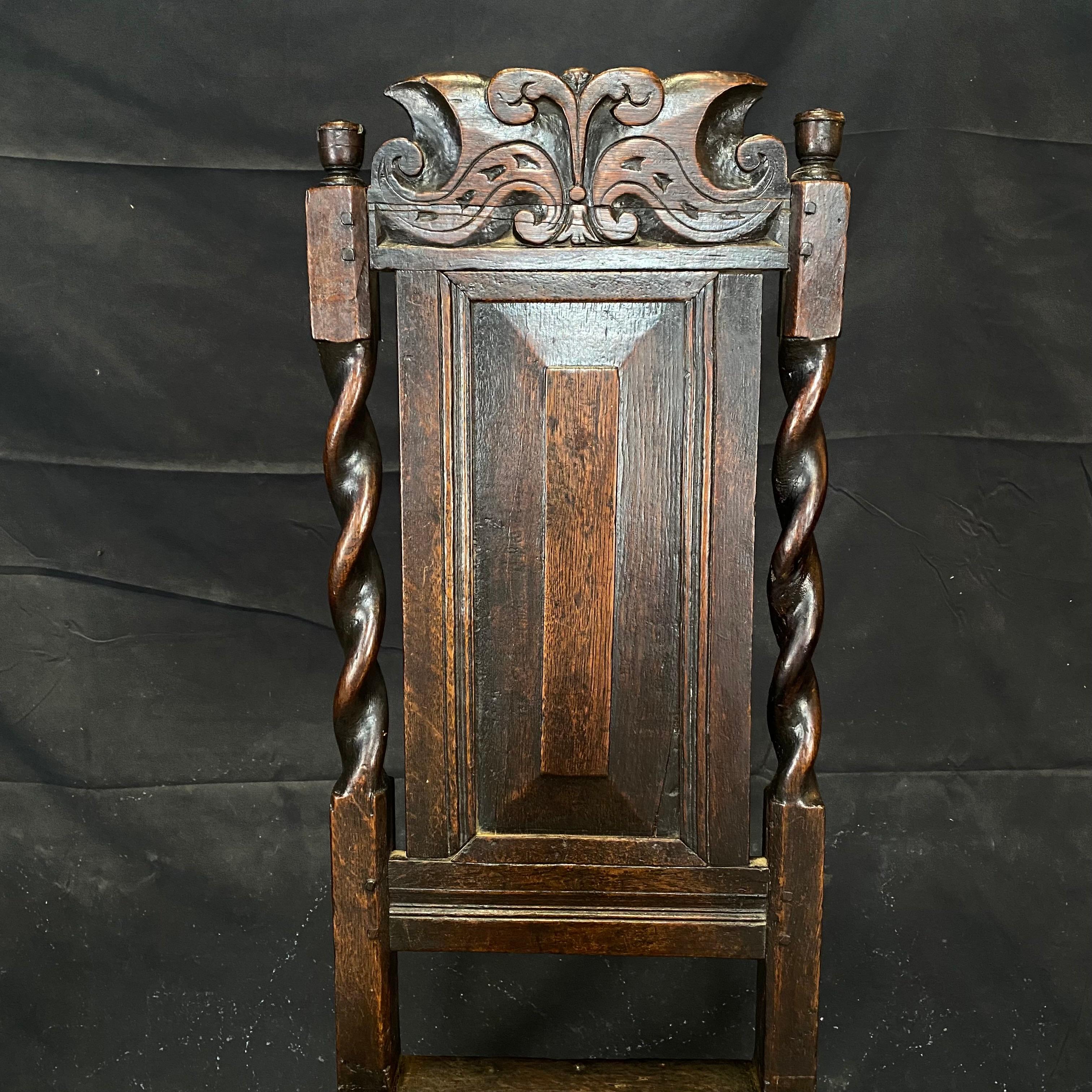Museum quality details in the carving of this super early French chair found in the Northwest of France. This chair would have been one of only a few if any other, chairs in a wealthy household . Would be lovely as a desk or side chair, or as